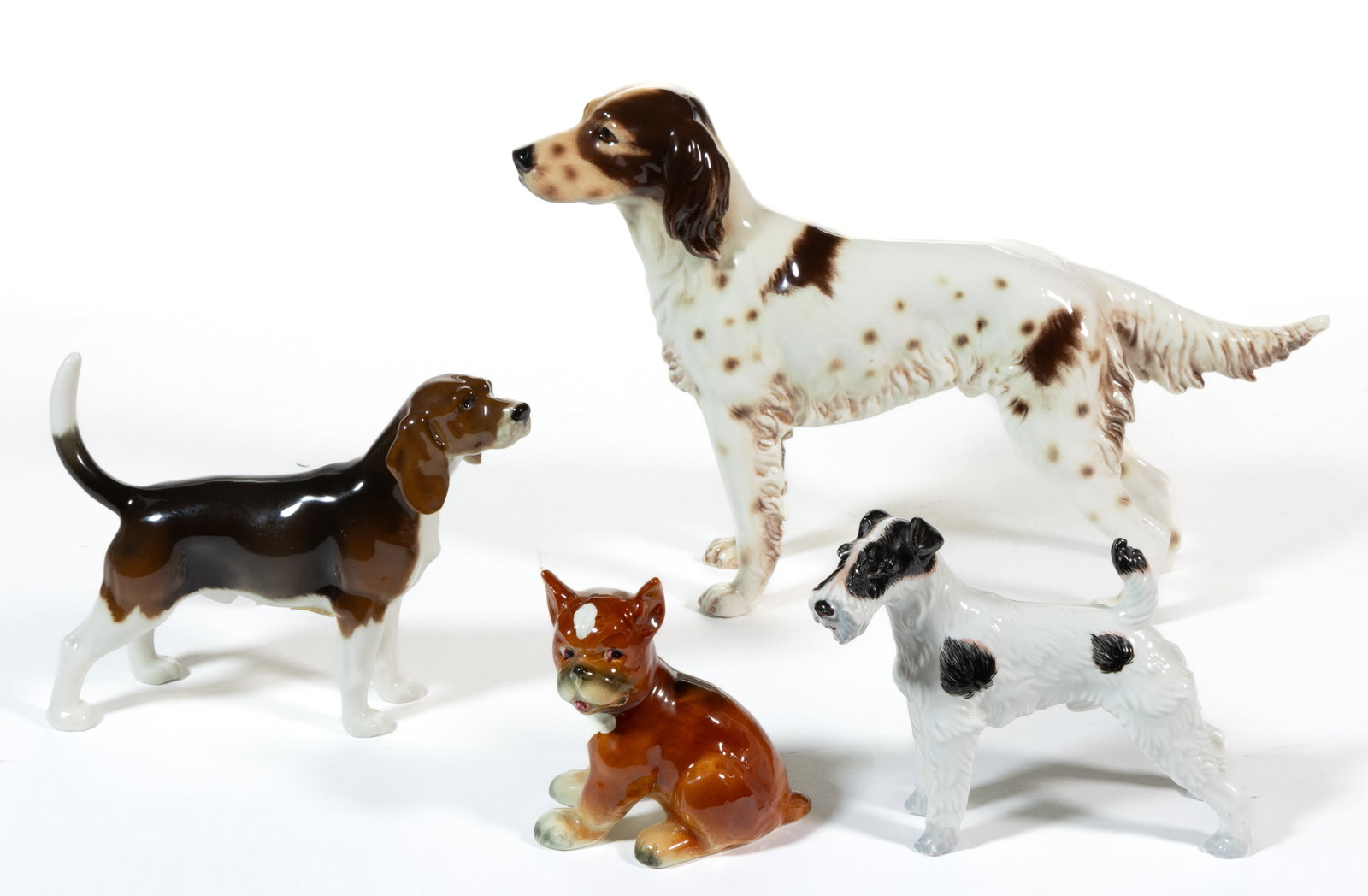 AUSTRIAN AND GERMAN HAND-PAINTED PORCELAIN DOG FIGURES, LOT OF FOUR (1 of 1)