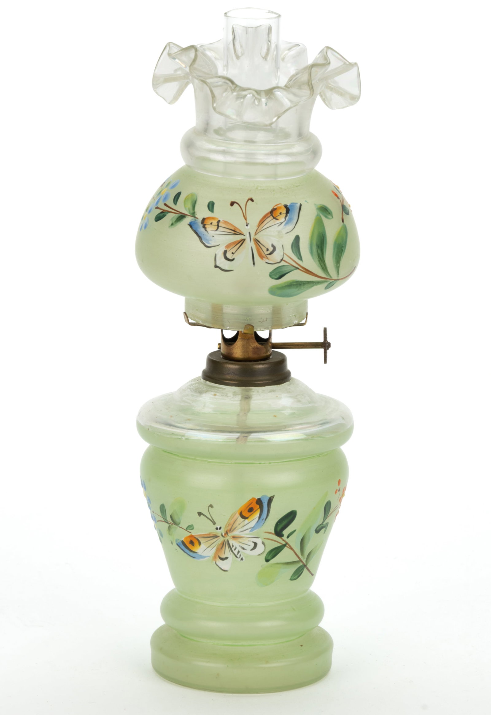 VICTORIAN FLORAL DECORATED MINIATURE LAMP: VICTORIAN FLORAL DECORATED MINIATURE LAMP, colorless with pail green satin shading, heavy polychrome enamel floral decoration depicting a butterfly with orange floral stem, font having a ringed s