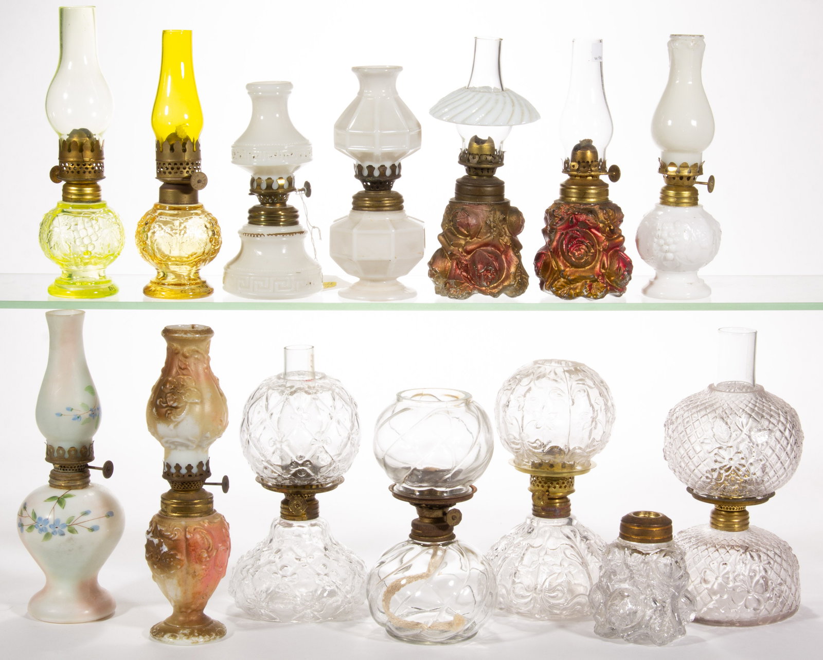 ASSORTED PATTERN GLASS MINIATURE LAMPS, LOT OF 14: ASSORTED PATTERN GLASS MINIATURE LAMPS, LOT OF 14, various colors including colorless, opaque white, and Vaseline (reacts under black light), patterns include three Boutique/Smith II, fig. 79 examples