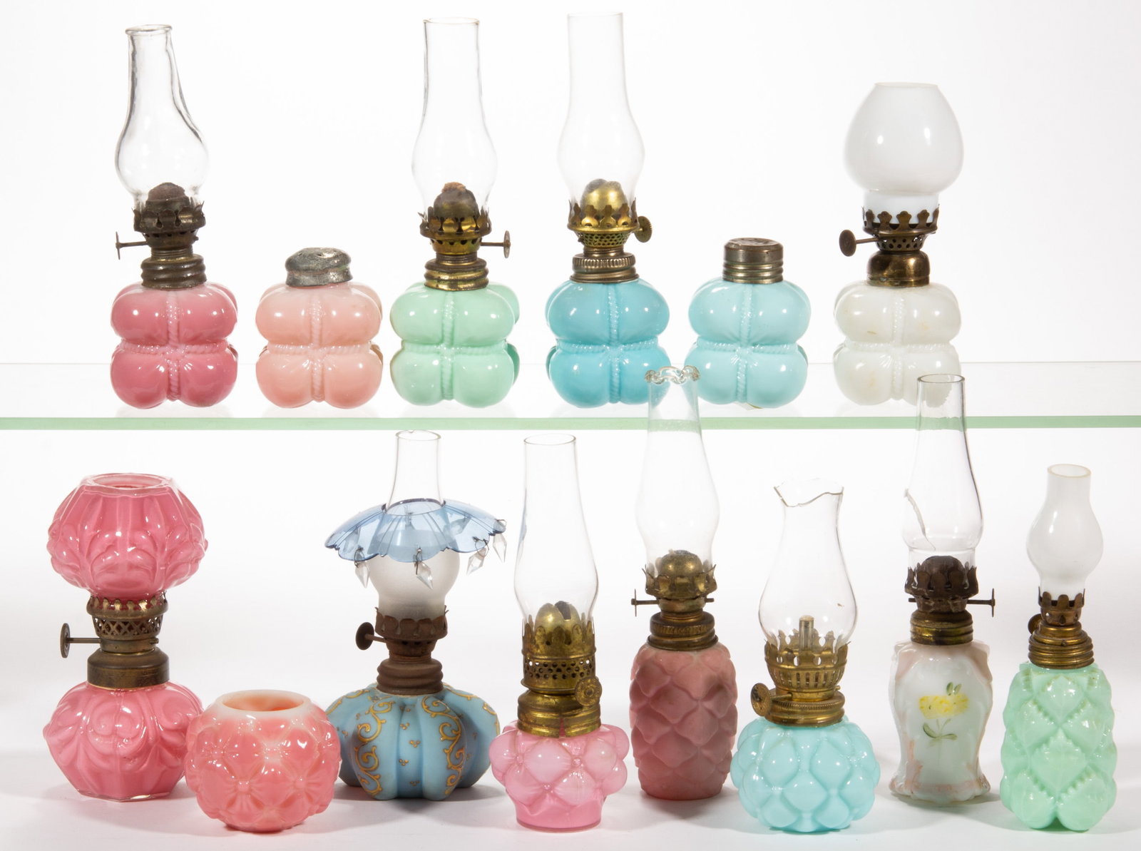 ASSORTED OPAQUE GLASS "MAKE-DO" MINIATURE LAMPS, LOT OF 14: ASSORTED OPAQUE GLASS "MAKE-DO" MINIATURE LAMPS, LOT OF 14, assorted colors, each example altered from a salt or pepper shaker, patterns include Quilted Phlox, Florette, and Cotton Bale, one