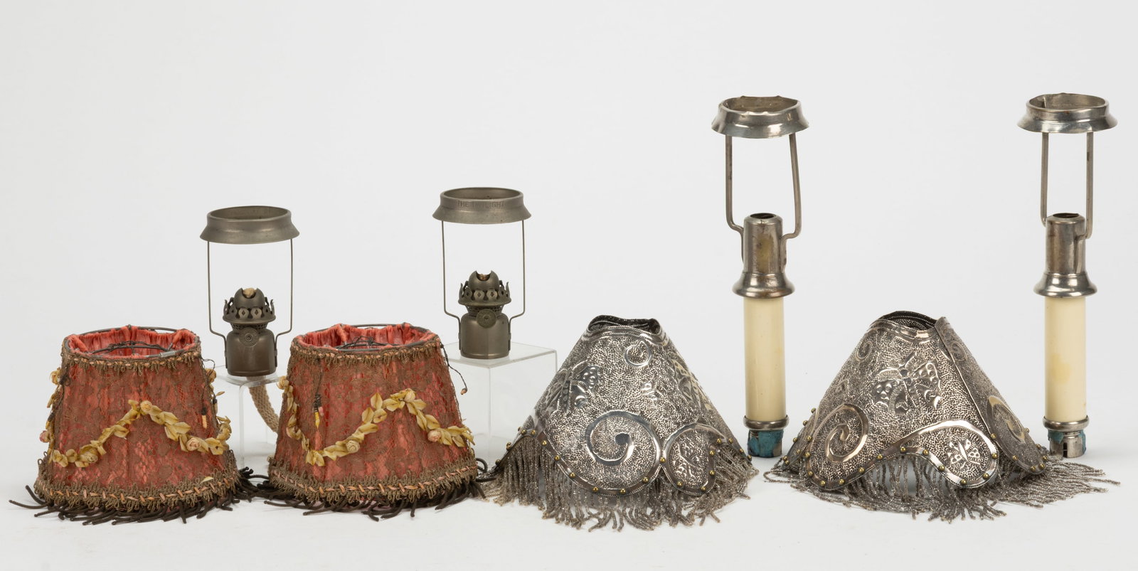 ASSORTED MINIATURE CANDLE LAMP COMPONENTS, LOT OF EIGHT: ASSORTED MINIATURE CANDLE LAMP COMPONENTS, LOT OF EIGHT, comprising of two fonts with cylinder-form holder and shade supports; two Twilight examples with Acorn burners, collar and shade