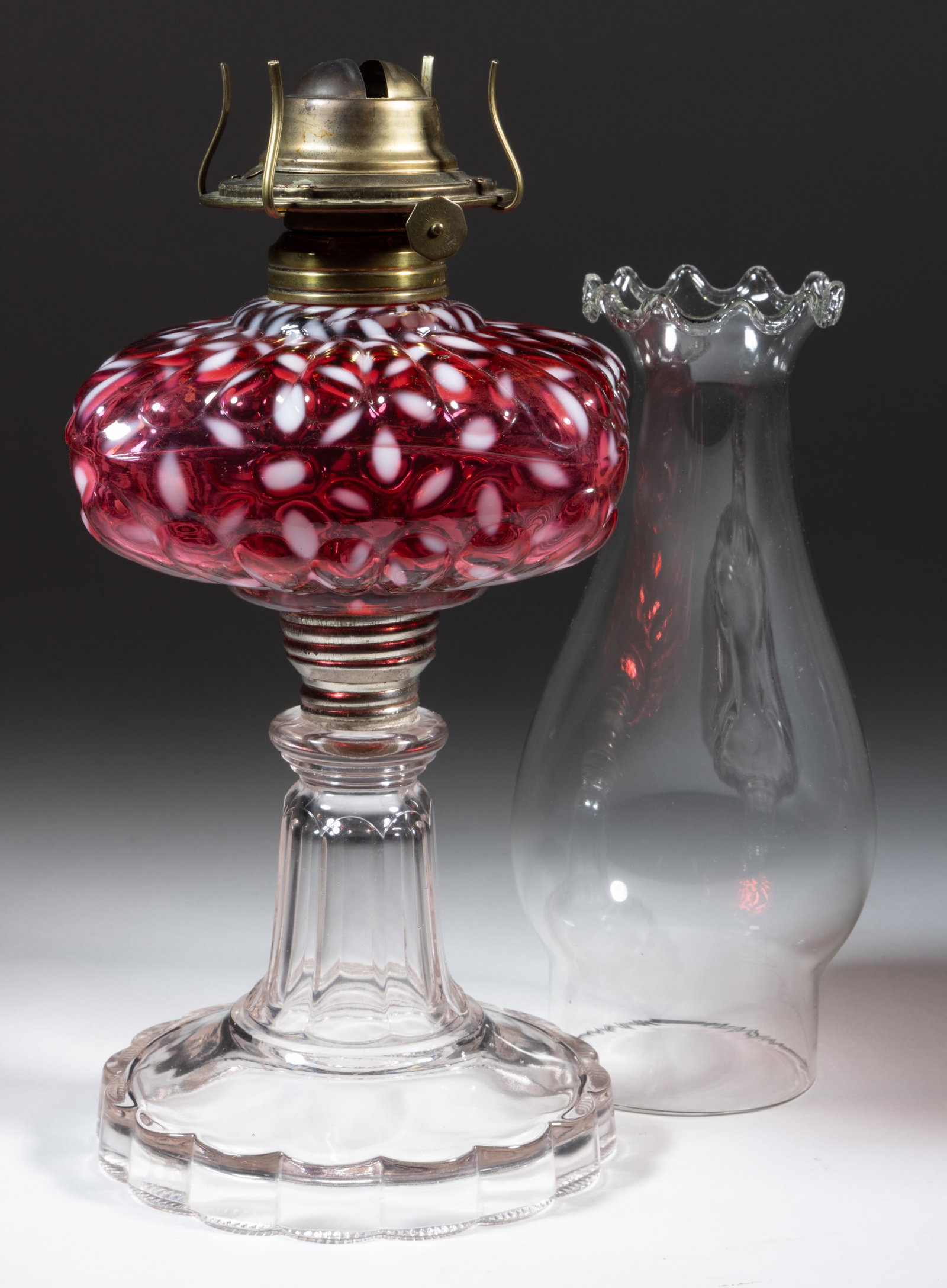 HOBBS NO. 341 / SNOWFLAKE KEROSENE STAND LAMP: HOBBS NO. 341 / SNOWFLAKE KEROSENE STAND LAMP, deep/dark Ruby/cranberry opalescent font, colorless base, metal screw connector lacking glass sleeve, No. 2 Taplin-Brown collar. Fitted with a perio