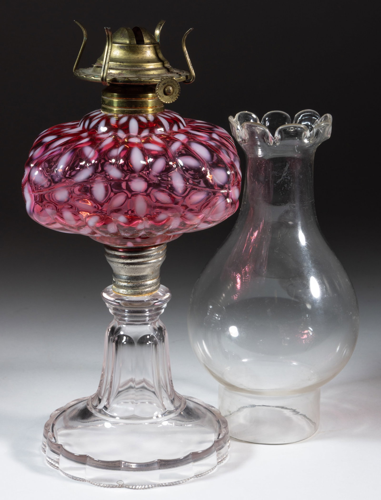 HOBBS NO. 341 / SNOWFLAKE KEROSENE STAND LAMP: HOBBS NO. 341 / SNOWFLAKE KEROSENE STAND LAMP, Ruby/cranberry opalescent font, colorless base, metal screw connector lacking glass sleeve, No. 1 Taplin-Brown collar. Fitted with a 