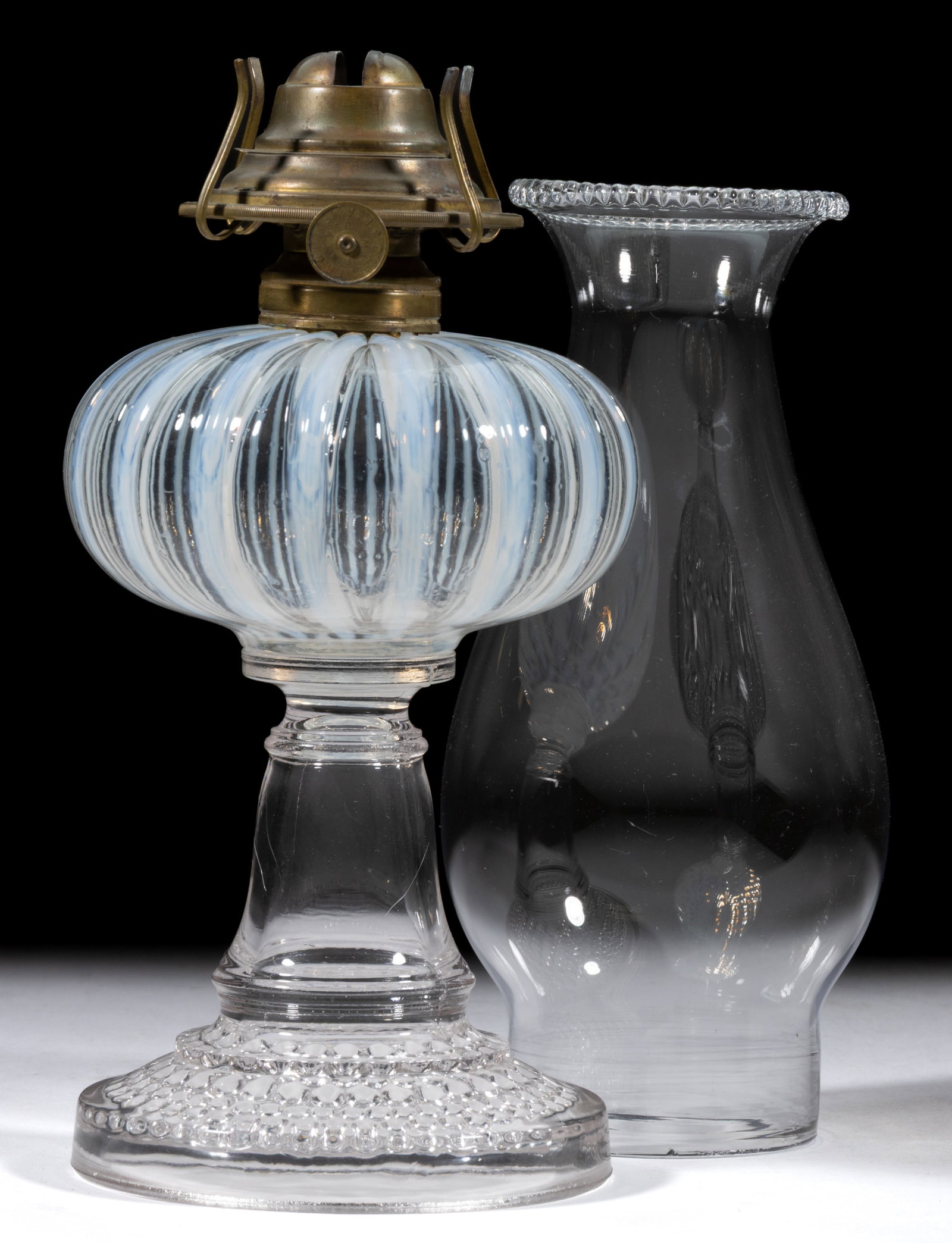 JENSEN KEROSENE STAND LAMP: JENSEN KEROSENE STAND LAMP, colorless opalescent Stripe font, colorless Dewdrop base, period No. 1 Taplin-Brown collar. Fitted with a period slip burner and a colorless chimney with a beaded top 