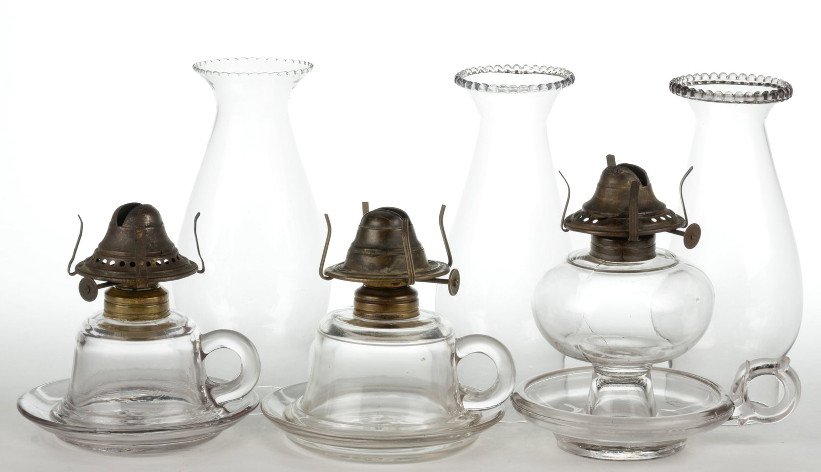 ASSORTED SAUCER-BASE KEROSENE FINGER AND FOOTED FINGER LAMPS, LOT OF THREE (1 of 1)