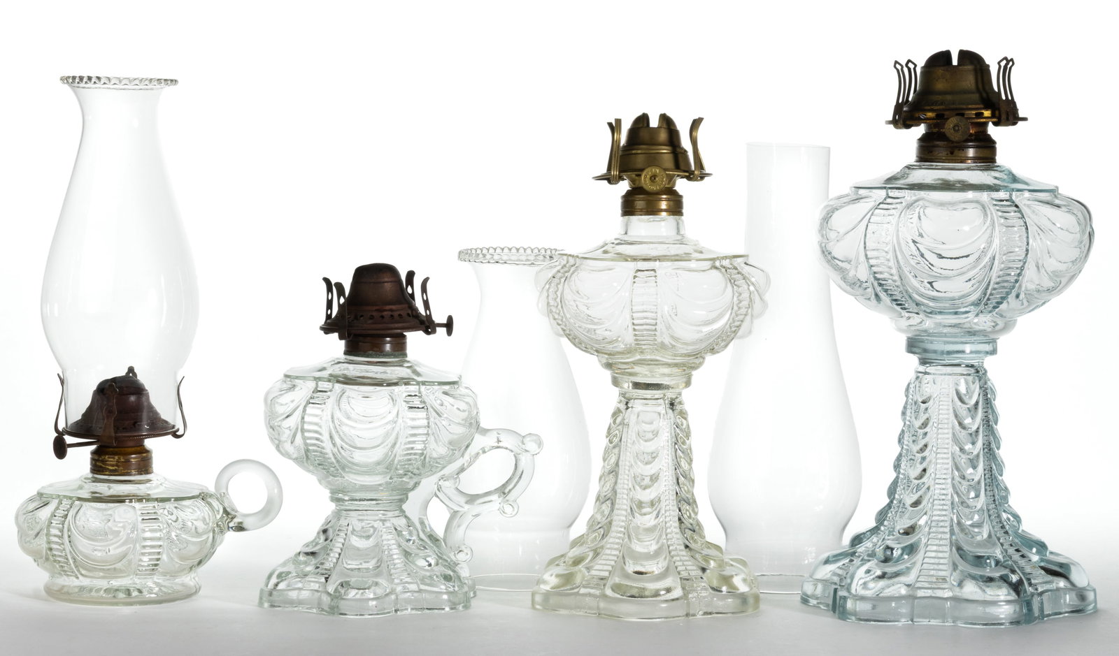 COOLIDGE DRAPE KEROSENE FINGER AND STAND LAMPS, LOT OF FOUR (1 of 1)