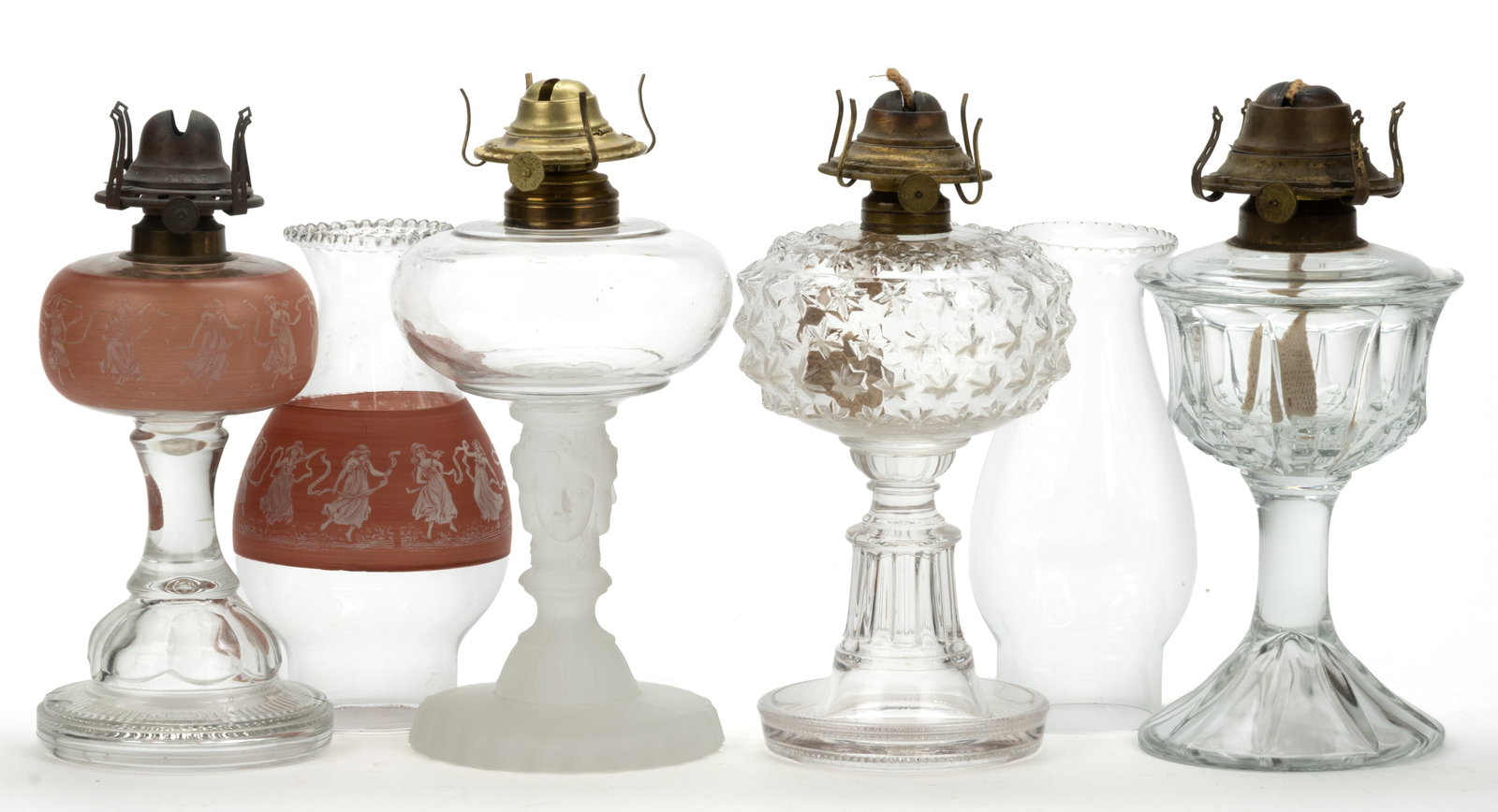 ASSORTED PATTERN KEROSENE STAND LAMPS, LOT OF FOUR (1 of 1)