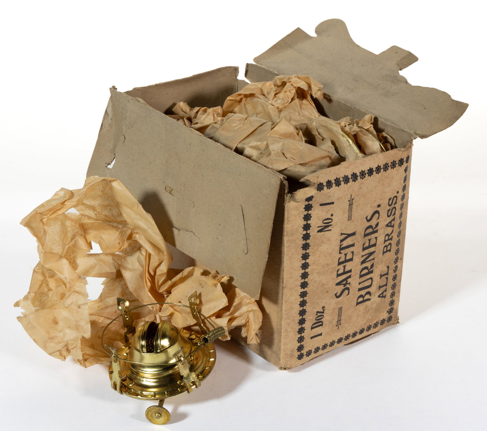 BRASS UNUSED NO. 1 SAFETY SLIP BURNERS IN ORIGINAL PACKAGING, LOT OF 12: BRASS UNUSED NO. 1 SAFETY SLIP BURNERS IN ORIGINAL PACKAGING, LOT OF 12, brass, having an additional wire support with spring for supporting the chimney, each with unmarked thumbwheel, each fitte