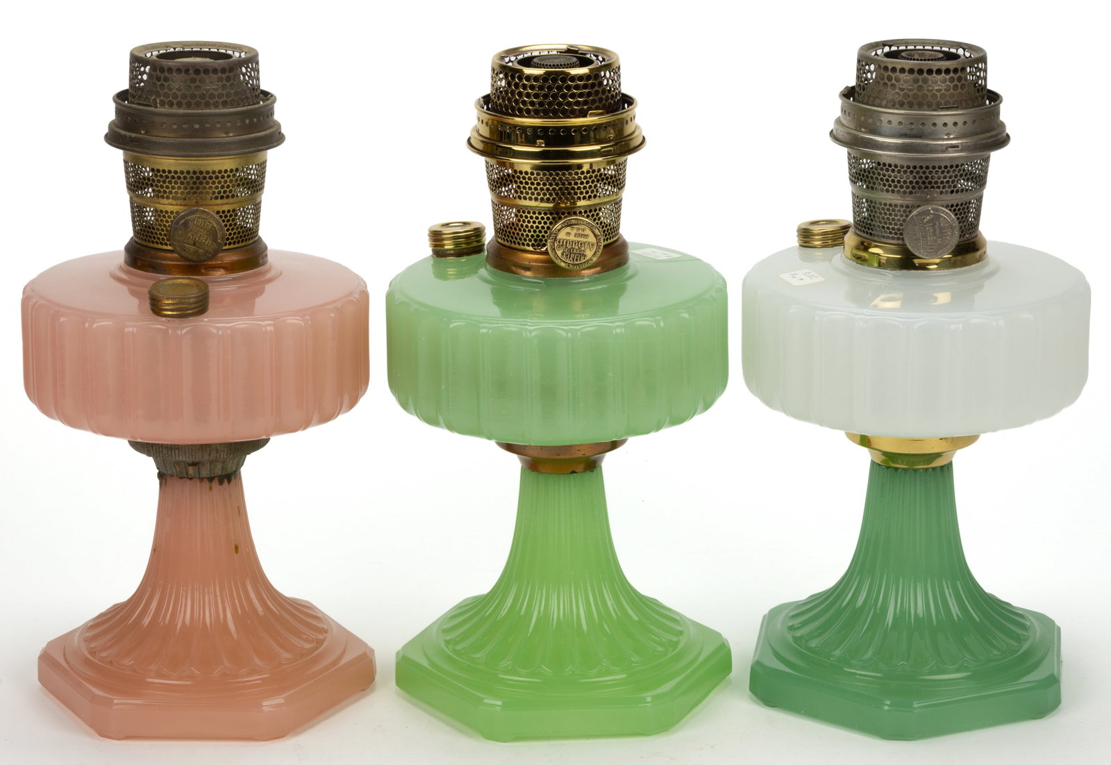 ALADDIN MODEL B-111, B-116, AND B-125 / CORINTHIAN KEROSENE STAND LAMPS, LOT OF THREE: ALADDIN MODEL B-111, B-116, AND B-125 / CORINTHIAN KEROSENE STAND LAMPS, LOT OF THREE, comprising of a White Moonstone Art Glass font with a Green Moonstone Art Glass/jade green base example; a G