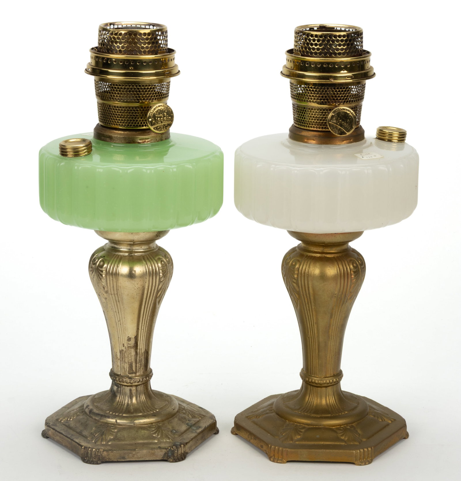 ALADDIN MODEL NO. B-120 AND B-122 / MAJESTIC KEROSENE STAND LAMPS, LOT OF TWO: ALADDIN MODEL NO. B-120 AND B-122 / MAJESTIC KEROSENE STAND LAMPS, LOT OF TWO, comprising of White Moonstone Art Glass font with later gold painted base and a Green Moonstone Art Glass font with 