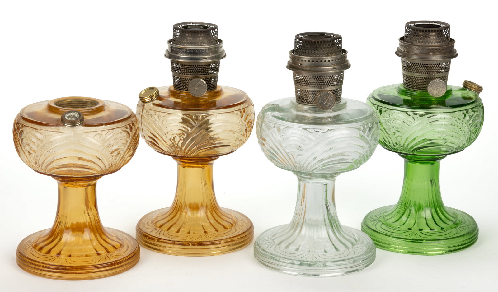ALADDIN MODEL B-39, B-40, AND B-41 / WASHINGTON DRAPE KEROSENE STAND LAMPS, LOT OF FOUR: ALADDIN MODEL B-39, B-40, AND B-41 / WASHINGTON DRAPE KEROSENE STAND LAMPS, LOT OF FOUR, comprising of two light Amber Beta Crystal; a Clear Beta Crystal; and one Green Beta Crystal; ea