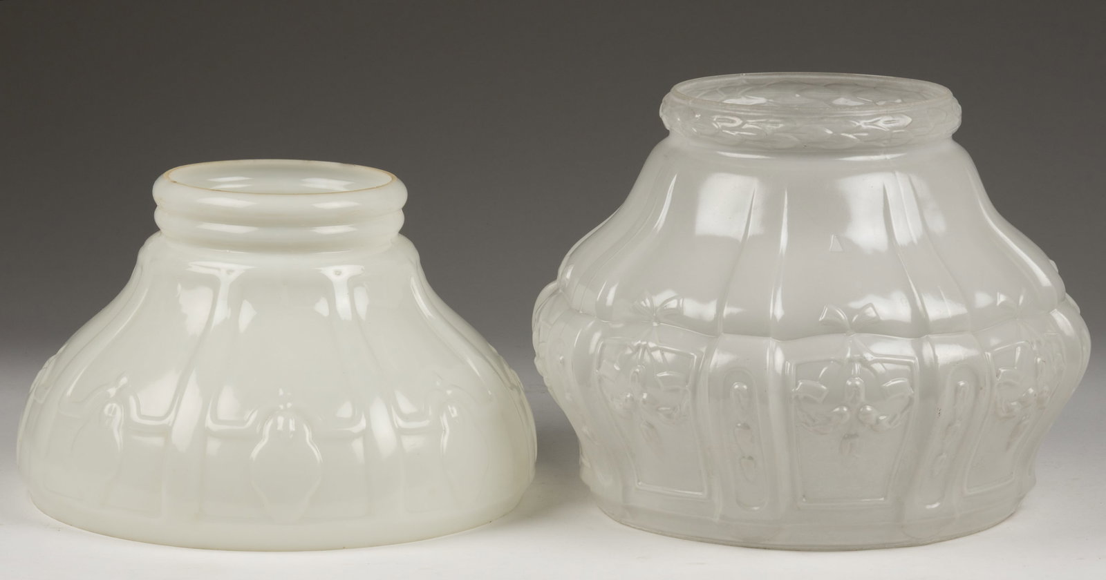 ALADDIN NO. 416 AND NO. 516 GLASS LAMP SHADES, LOT OF TWO: ALADDIN NO. 416 AND NO. 516 GLASS LAMP SHADES, LOT OF TWO, satin white and white opal, used on Model 7 and Model 9/10 hanging lamps, each having ground rims. The Mantle Lamp Company of 