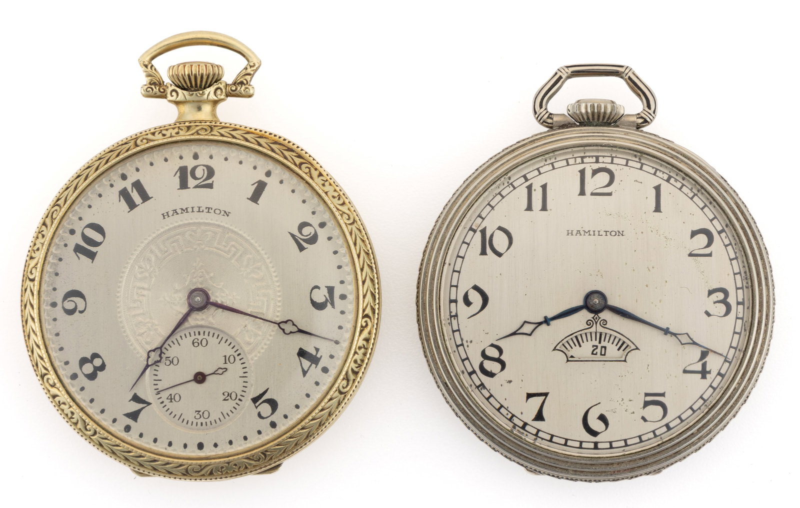 HAMILTON 17-JEWEL POCKET WATCHES, LOT OF TWO: HAMILTON 17-JEWEL 14K GOLD-FILLED POCKET WATCHES, LOT OF TWO, comprising a Grade 910, model 1 (serial no. 1851818), 17-jewels, pendant-set movement, with a silver dial with a center Roman key-like eng