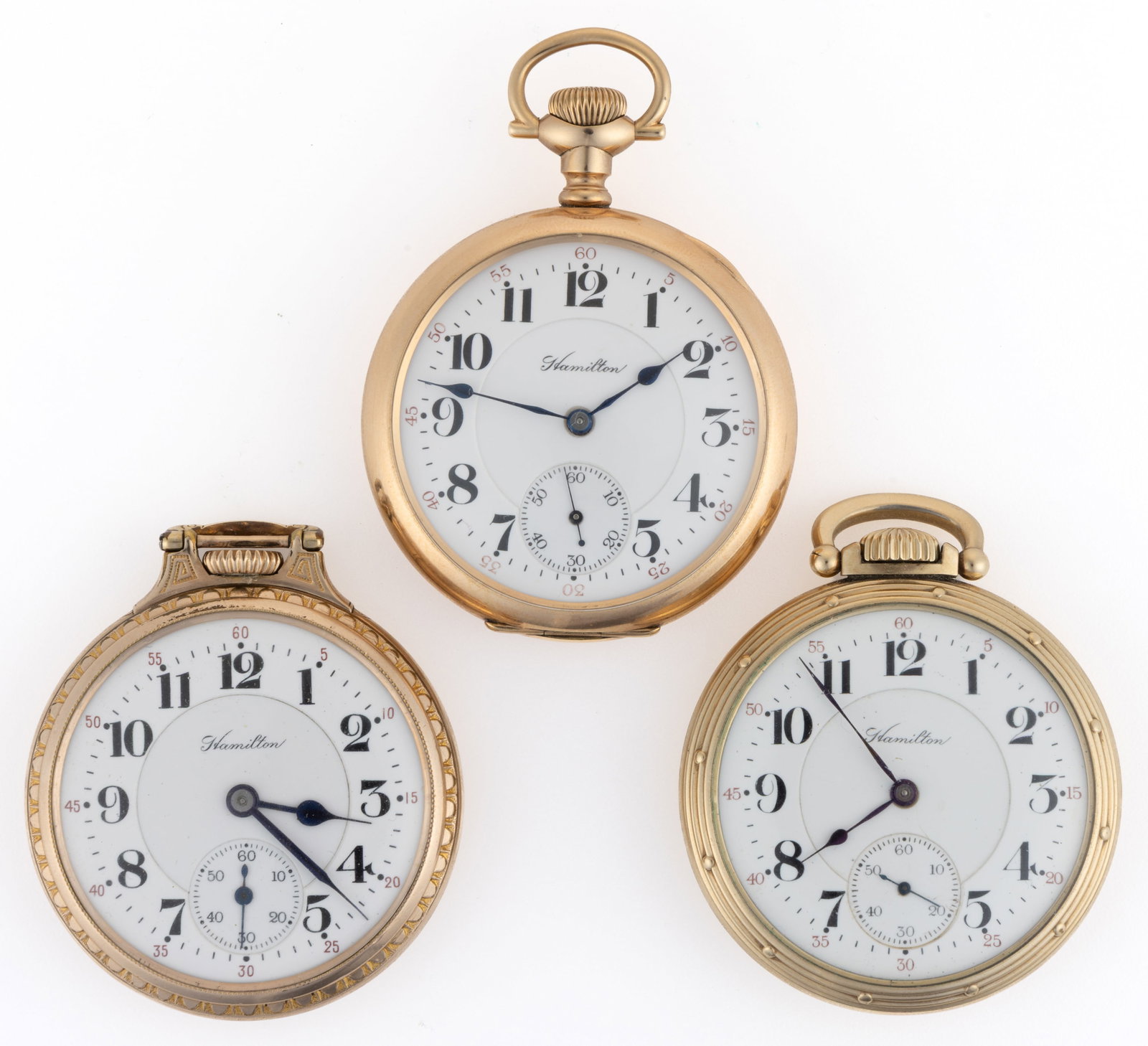 HAMILTON 21- AND 23-JEWEL POCKET WATCHES, LOT OF THREE: HAMILTON 21- AND 23-JEWEL POCKET WATCHES, LOT OF THREE, comprising Grade 950, model 3 (serial no. 1022394), 23-jewels, lever-set movement, with white enamel dial, Arabic numeral chapter ring, blued-st