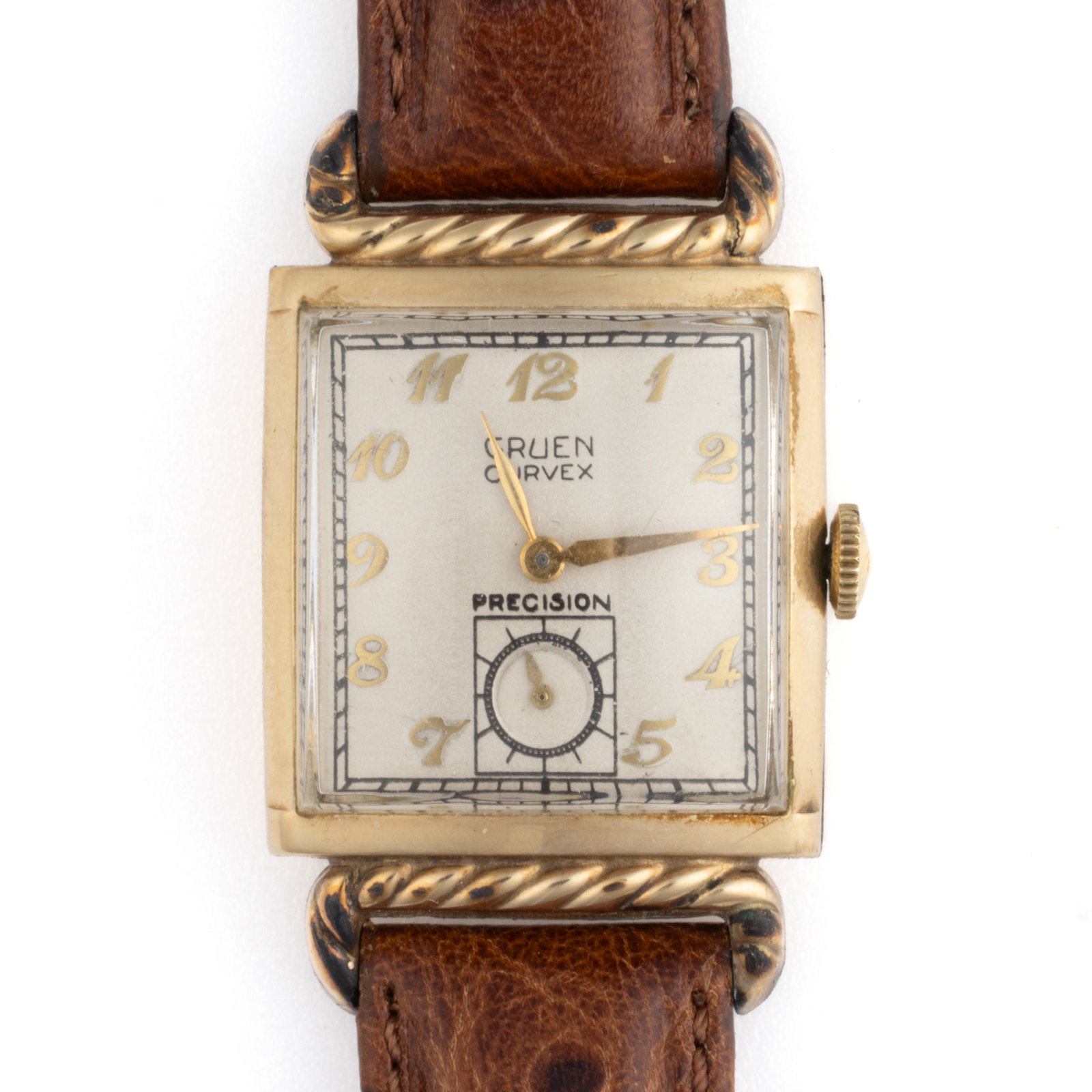 VINTAGE GRUEN CURVEX PRECISION 10K YELLOW GOLD FILLED-CASED UNISEX WRIST WATCH: VINTAGE GRUEN CURVEX PRECISION 10K YELLOW GOLD FILLED-CASED UNISEX WRIST WATCH, 17-jewels, serial number 334778, champagne-colored dial with gold Arabic numerals and sub-dial at 6 position, housed in 
