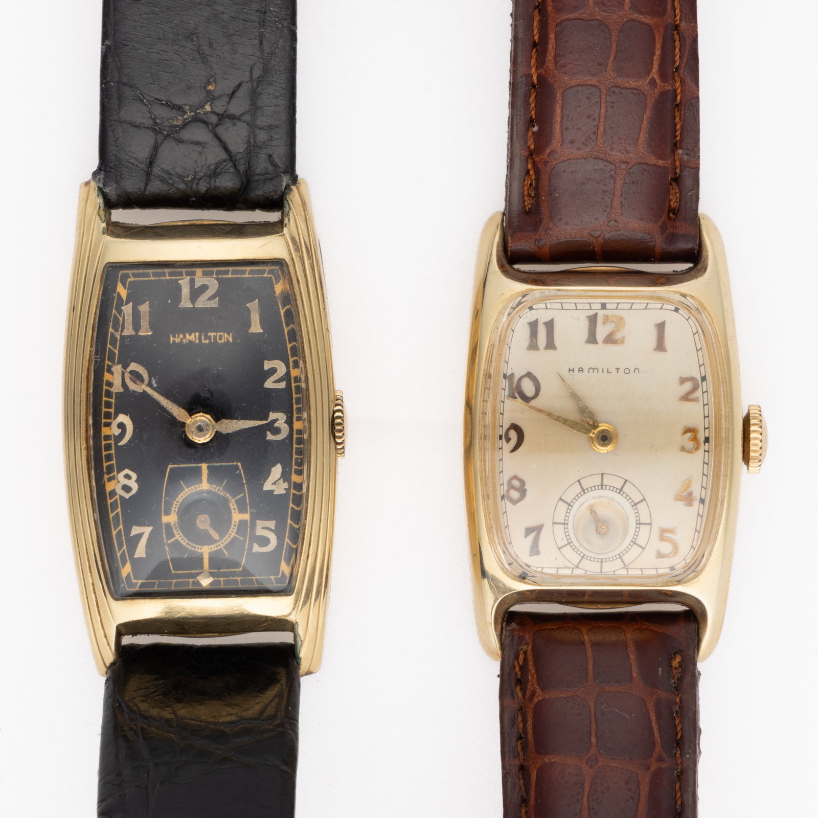 VINTAGE HAMILTON 14K YELLOW GOLD FILLED-CASED UNISEX WRIST WATCHES, LOT OF TWO: VINTAGE HAMILTON 14K YELLOW GOLD FILLED-CASED UNISEX WRIST WATCHES, LOT OF TWO, comprising a Hamilton Curvex, 19-jewels, black dial with gold Arabic numerals with sub-dial at 6 position, housed in 14K
