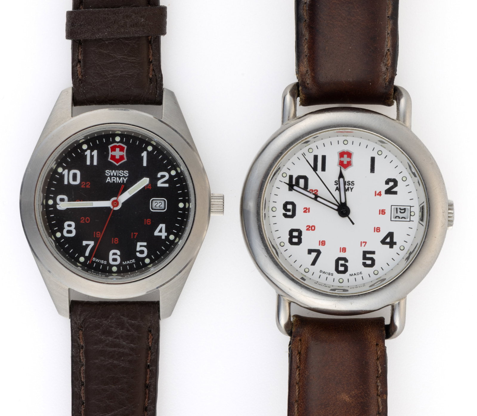 SWISS ARMY VICTORINOX MEN'S WRIST WATCHES, LOT OF TWO: SWISS ARMY VICTORINOX MEN'S WRIST WATCHES, LOT OF TWO, comprising a Cavalry with white dial, black Arabic numerals, date aperture at 3 position, luminous hands and hour dots, housed in round stain