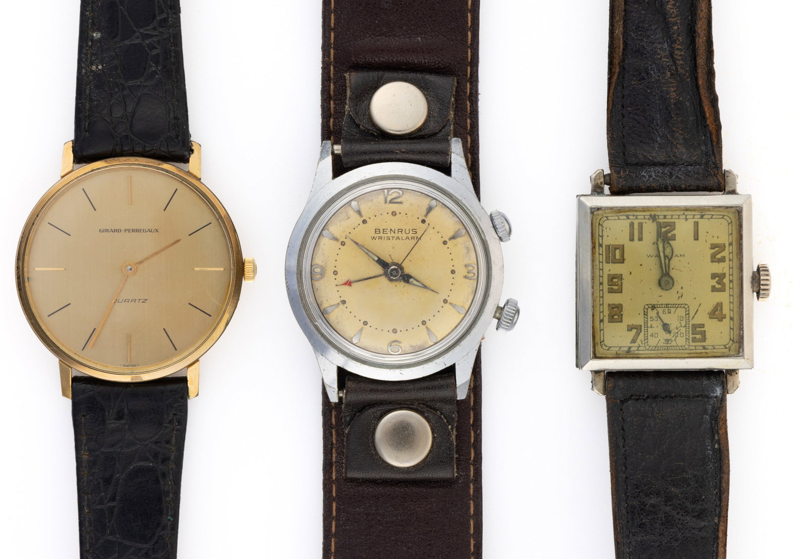 VINTAGE MEN'S WRIST WATCHES, LOT OF THREE: VINTAGE MEN'S WRIST WATCHES, LOT OF THREE, including Girard Perregaux Quartz, with gold dial, gold bar indices, gold bar hands housed in a round case with 18k gold electroplate bezel with stainles