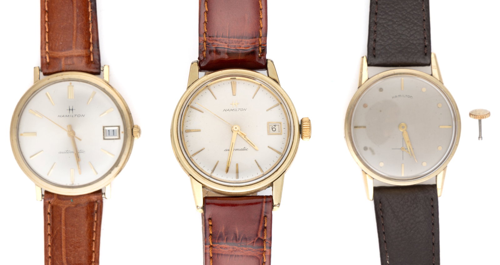 VINTAGE HAMILTON MEN'S WRIST WATCHES, LOT OF THREE: VINTAGE HAMILTON MEN'S WRIST WATCHES, LOT OF THREE, comprising one 1958 Hamilton "Norman", 22-jewel, with sterling silver dial and 14K gold markers and dots, housed in a 10K gold-filled 