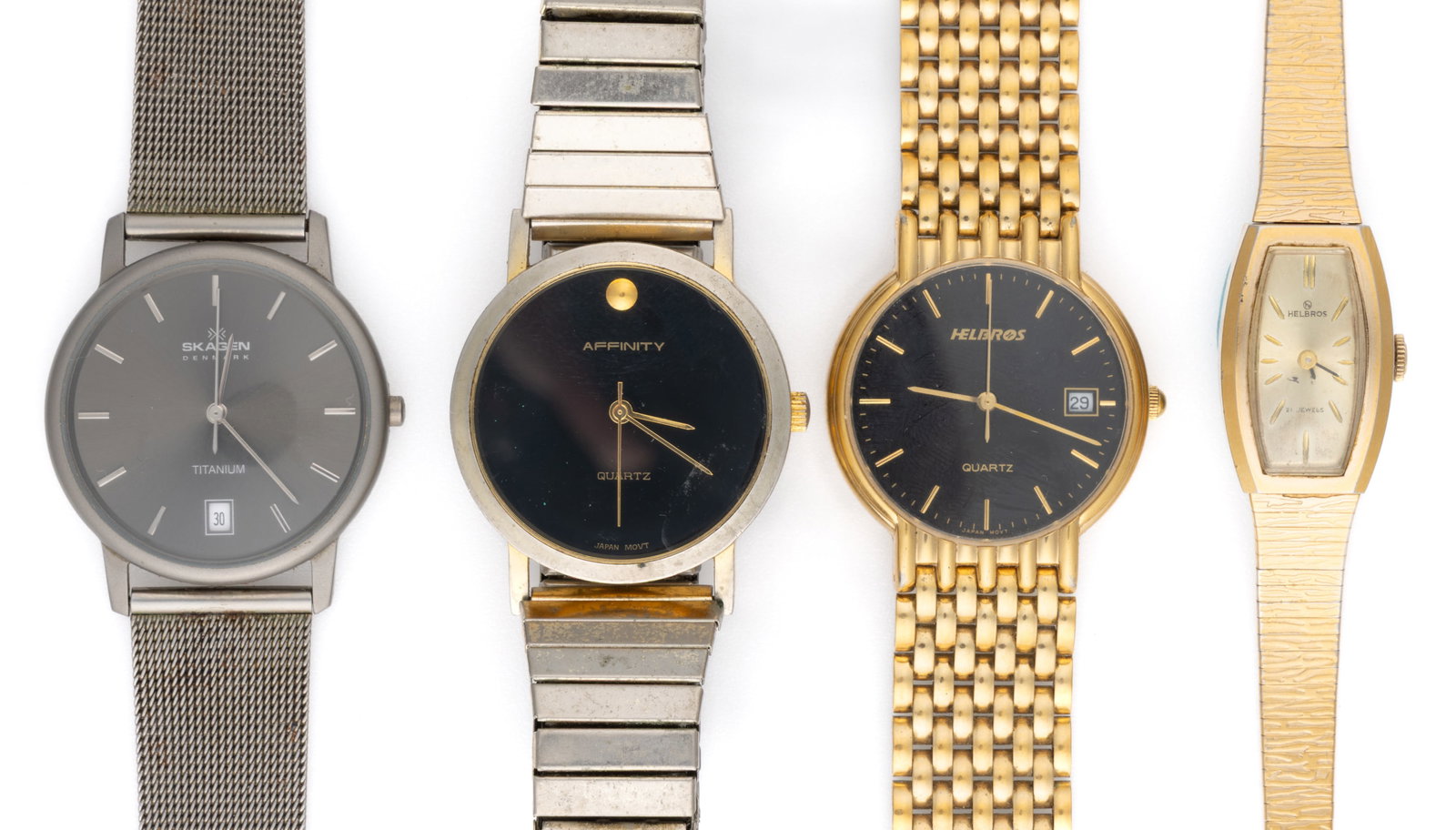 ASSORTED VINTAGE WRIST WATCHES WITH BRACELETS, LOT OF FOUR: ASSORTED VINTAGE WRIST WATCHES WITH BRACELETS, LOT OF FOUR, comprising a women's Helbros 21-jewel watch with a gold dial with gold bar indices in a rectangular gold tone stainless steel case with 