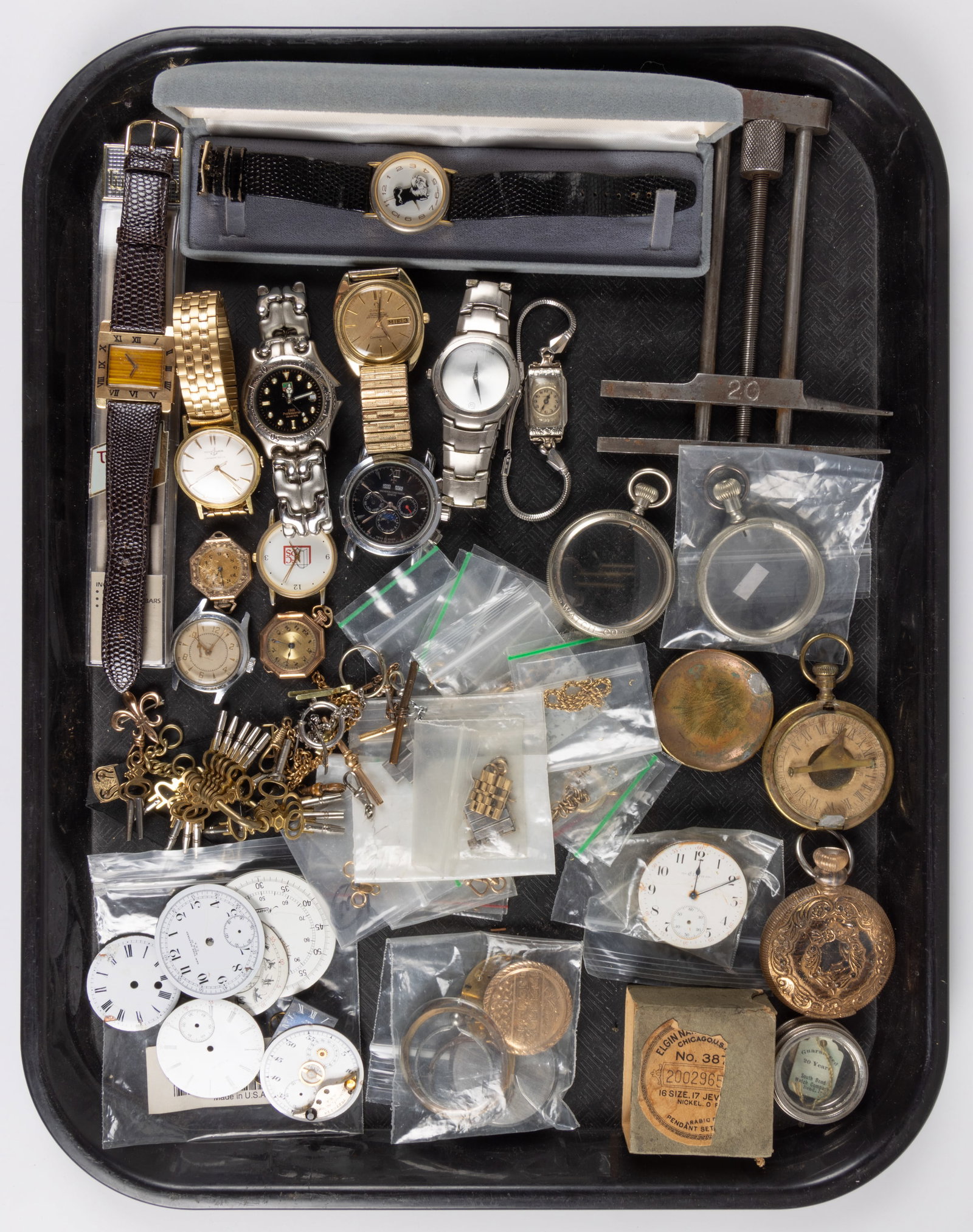 ASSORTED POCKET AND WRIST WATCH PARTS AND OTHER ARTICLES, UNCOUNTED LOT: ASSORTED POCKET AND WRIST WATCH PARTS AND OTHER ARTICLES, UNCOUNTED LOT, more than 20 pieces, including Elgin and New York Standard pocket watch dials, various-sized cases, chains, straps, bracel