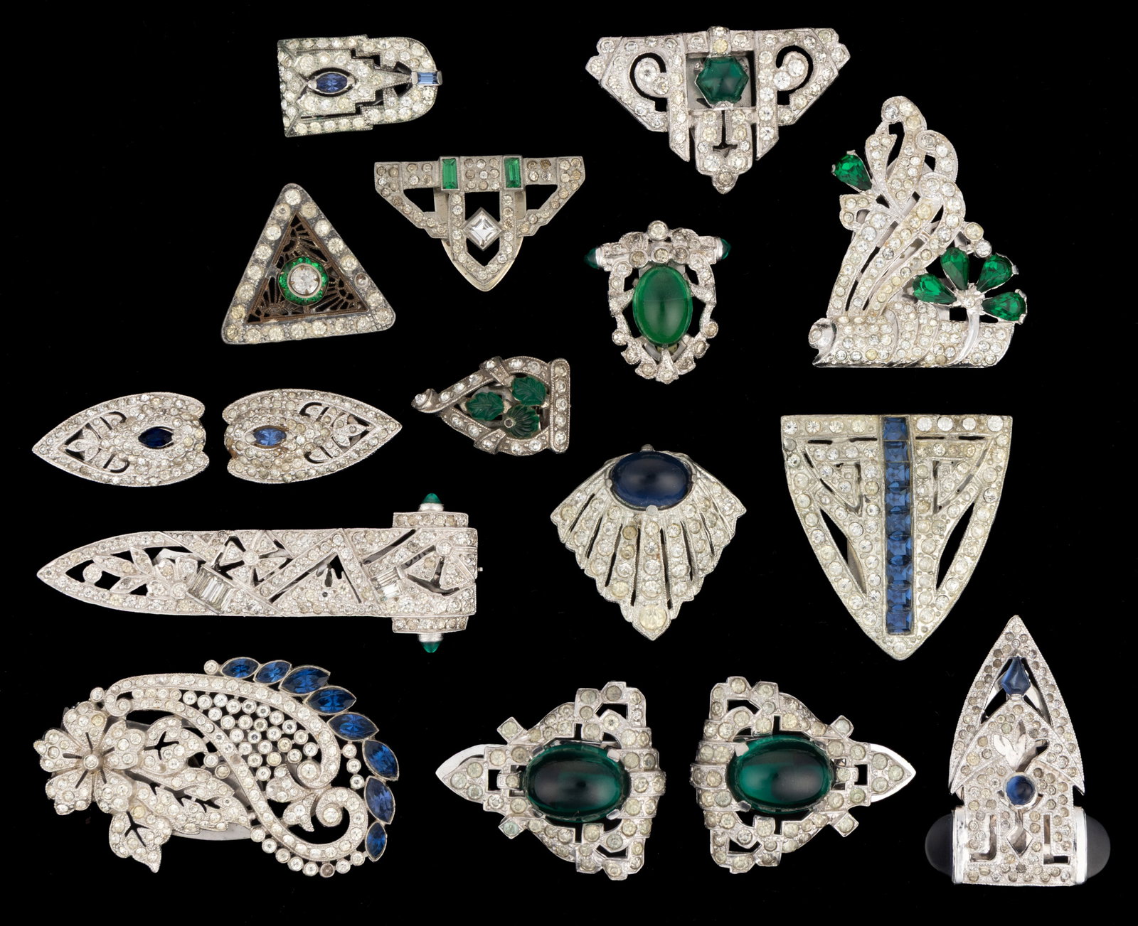 VINTAGE ART DECO RHINESTONE DRESS CLIPS, LOT OF 16: VINTAGE ART DECO RHINESTONE DRESS CLIPS, LOT OF 16, each piece made with silver-toned metal featuring colorless rhinestones and a hinged clip to back, comprising nine with green rhinestone accent
