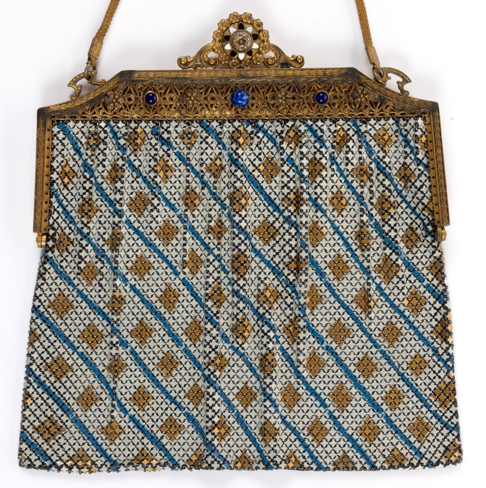 ANTIQUE / VINTAGE MANDALIAN ART DECO METAL MESH PURSE: ANTIQUE / VINTAGE MANDALIAN ART DECO METAL MESH PURSE, having blue, gold, and white enamel geometric decoration, featuring filigree-type openwork gold-toned hinged frame with flower accents, three blu