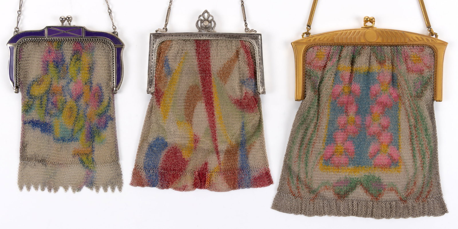 ANTIQUE / VINTAGE WHITING & DAVIS ART DECO DRESDEN METAL MESH PURSES, LOT OF THREE: ANTIQUE / VINTAGE WHITING & DAVIS ART DECO DRESDEN METAL MESH PURSES, LOT OF THREE, each having polychrome enamel decoration, suspended from a chain strap, comprising the smallest with purple enam