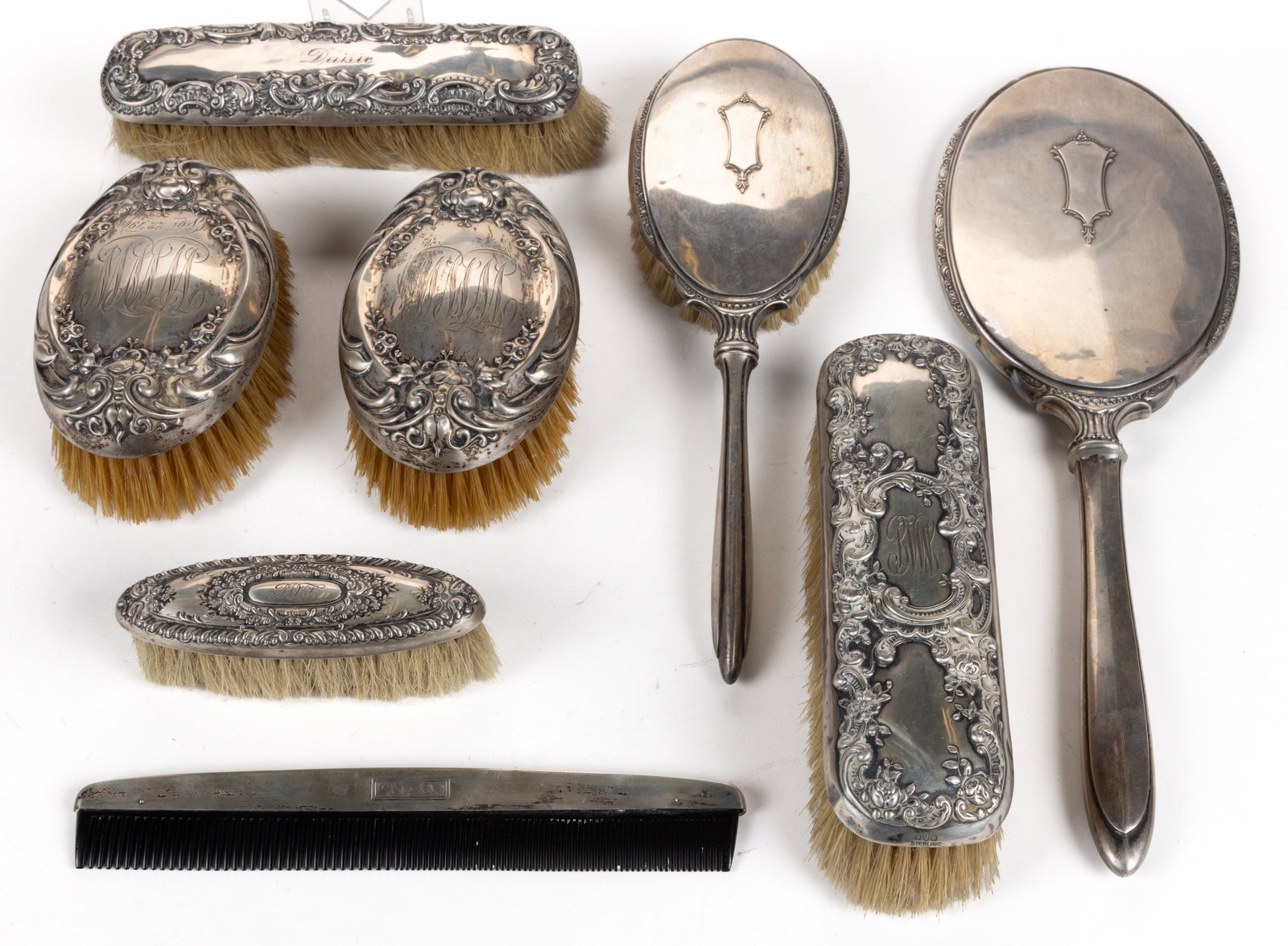 INTERNATIONAL SILVER CO. AND OTHER STERLING SILVER-HANDLED DRESSER / VANITY ARTICLES, LOT OF EIGHT: INTERNATIONAL SILVER CO. AND OTHER STERLING SILVER-HANDLED DRESSER / VANITY ARTICLES, LOT OF EIGHT, comprising a pair of military / clothes brushes by International Silver Co. of Meriden, CT featuring