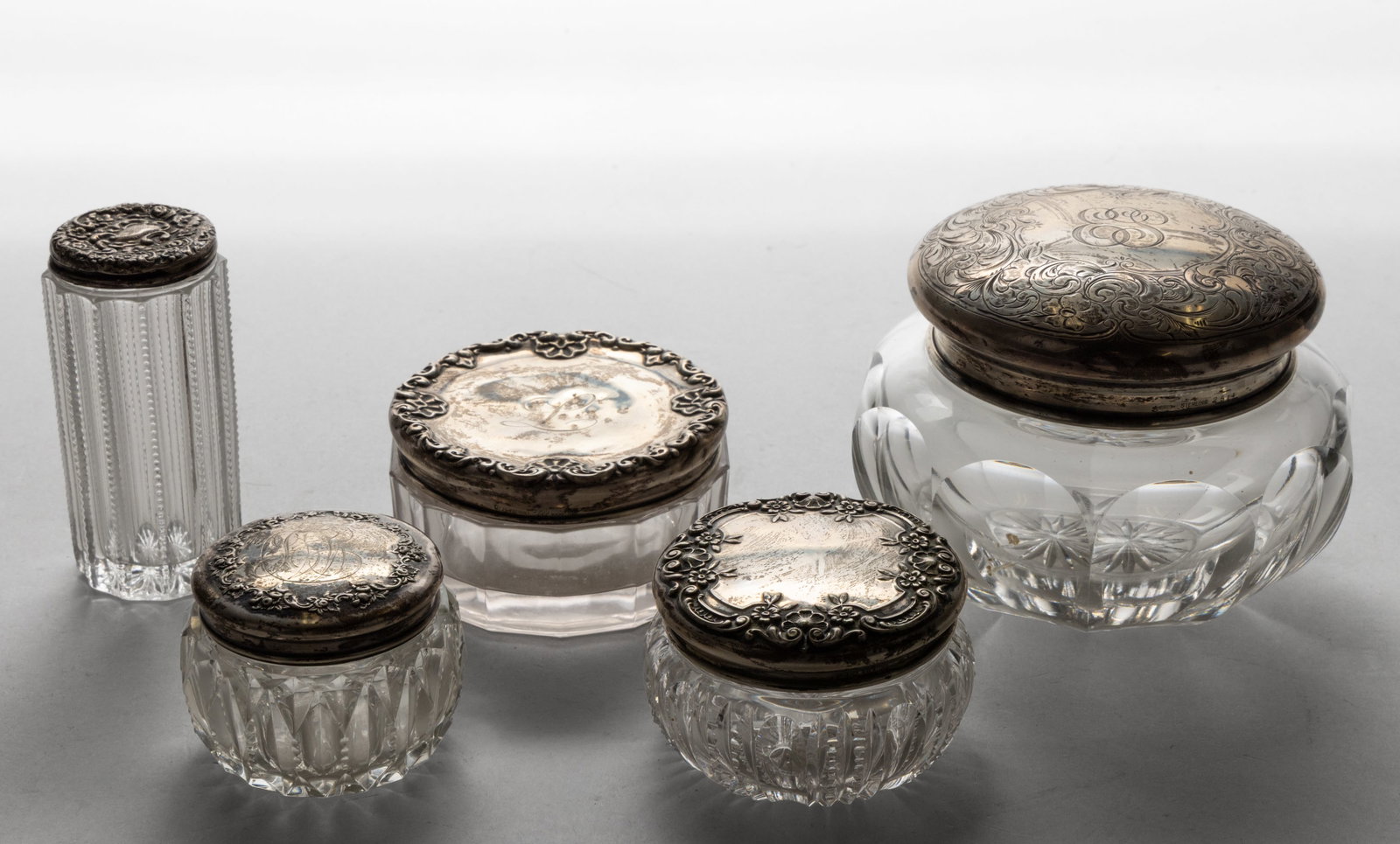 WM. B. KERR & CO. AND OTHER STERLING SILVER AND GLASS DRESSER JARS, LOT OF FIVE (1 of 1)