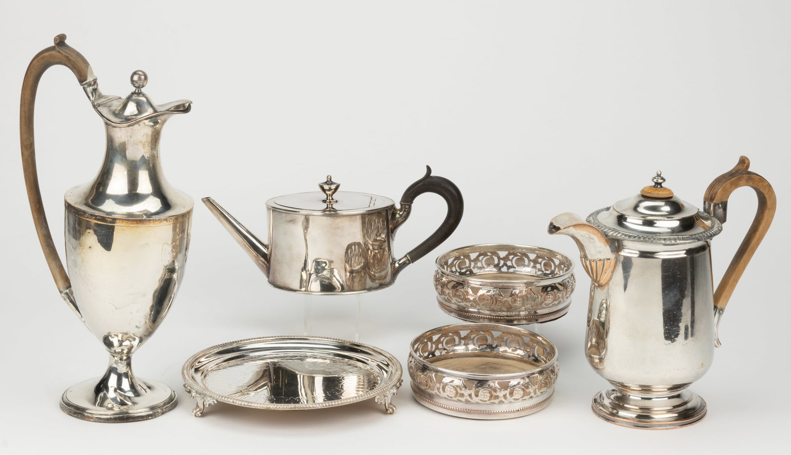 ASSORTED OLD SHEFFIELD PLATE / SILVER-PLATED ARTICLES, LOT OF SIX: ASSORTED OLD SHEFFIELD PLATE / SILVER-PLATED ARTICLES, LOT OF SIX, comprising a pair of wine bottle coasters, each round form with a silver-plated gallery rim having openwork designs, featuring