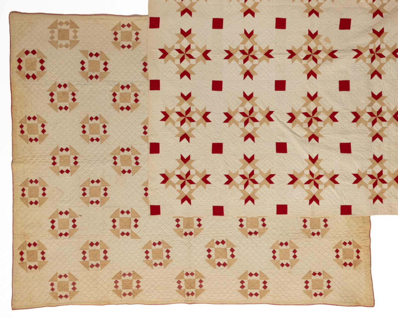 AMERICAN, POSSIBLY VIRGINIA, PIECED QUILTS, LOT OF TWO: AMERICAN, POSSIBLY VIRGINIA, PIECED QUILTS, LOT OF TWO, hand- and machine-stitched, completed in solid red, tan / fugitive color, and white fabrics; a "Double Star" example with 25 pattern b