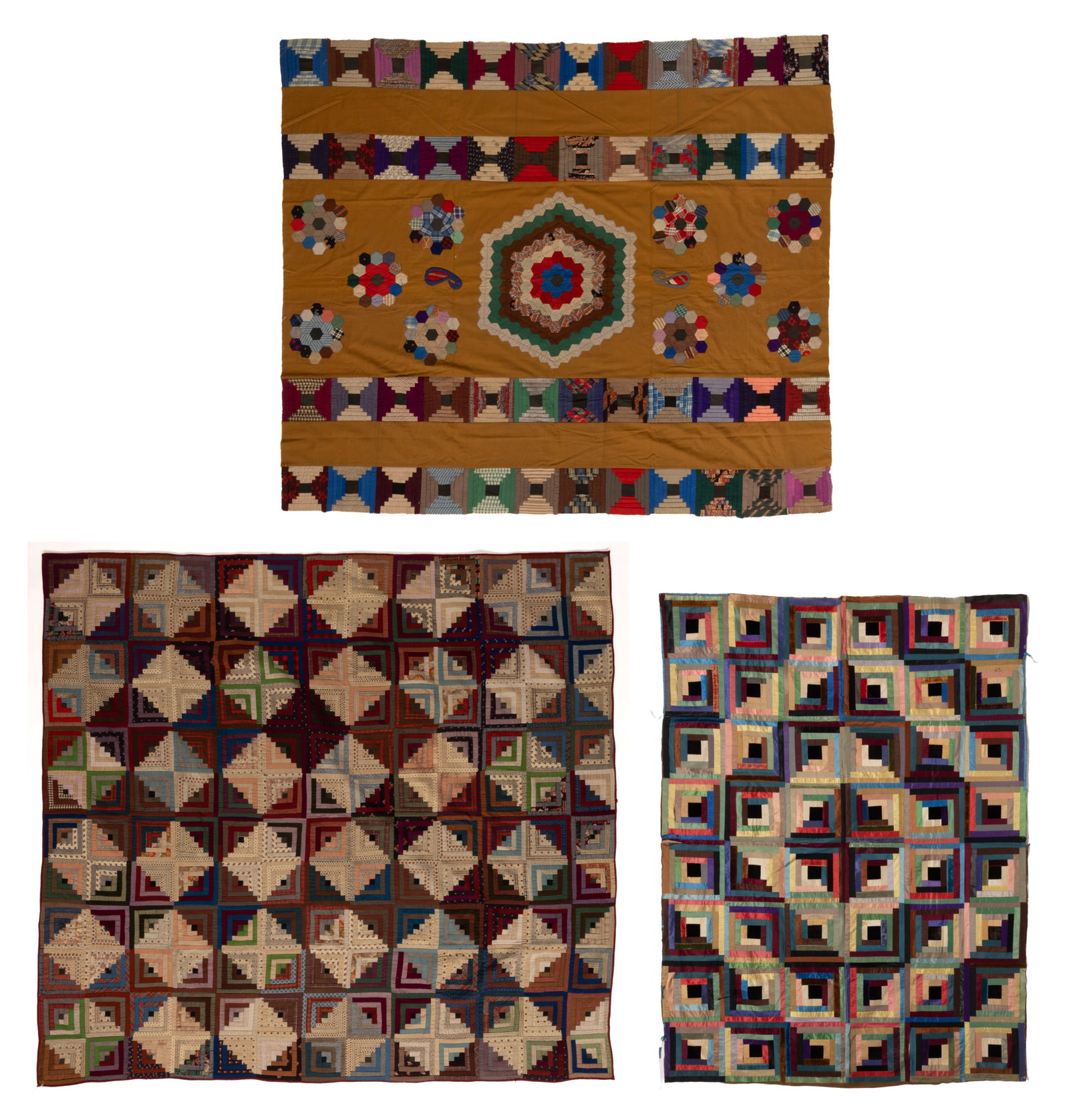 AMERICAN "LOG CABIN" PIECED QUILTS AND BEDDING, LOT OF THREE: AMERICAN "LOG CABIN" PIECED QUILTS AND BEDDING, LOT OF THREE, hand-stitched, completed in polychrome print, woven, and/or solid fabrics; comprising a "Log Cabin - Light and Dark" q