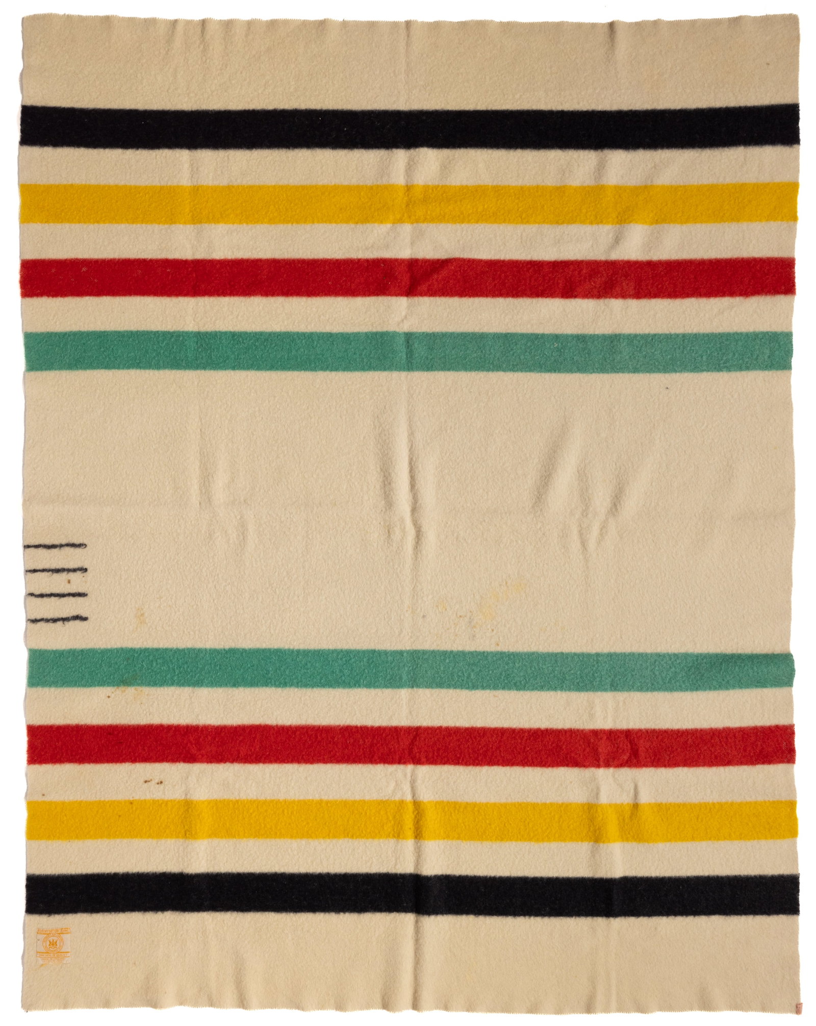 HUDSON'S BAY 4 POINT WOOL BLANKET: HUDSON'S BAY 4 POINT WOOL BLANKET, twill-woven, cream with black, yellow, red, and green stripes, one side edge near center with four woven points. One corner with original label that reads, "