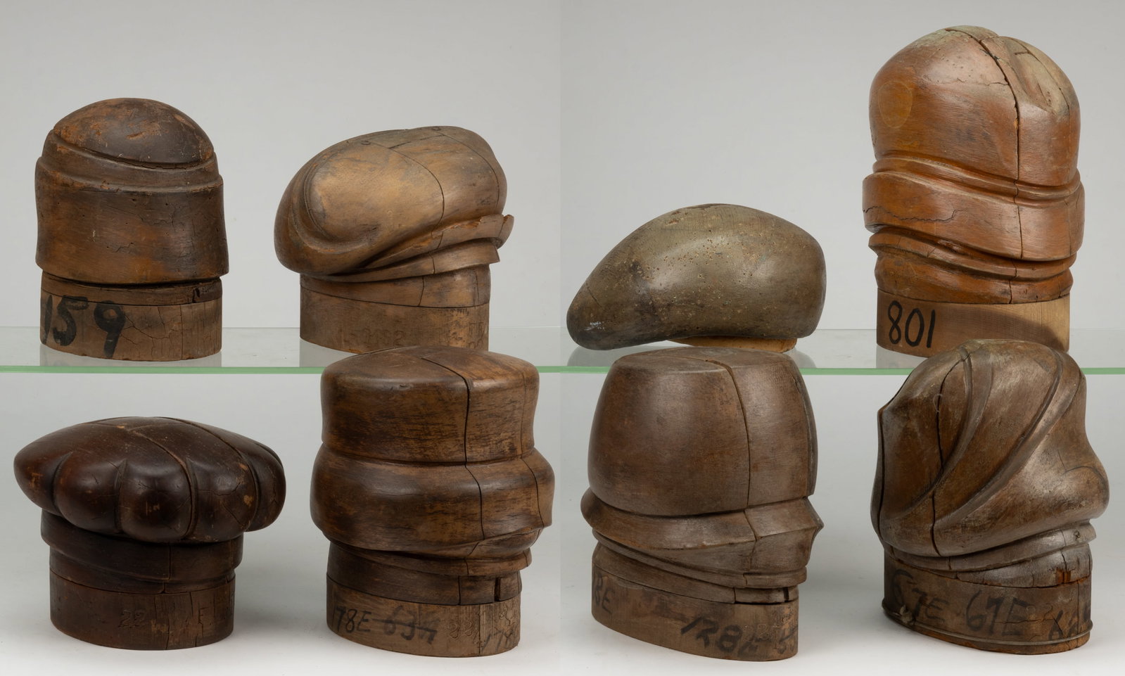 MILLINER'S HAT MOLDS / FORMS, LOT OF EIGHT: MILLINER'S HAT MOLDS / FORMS, LOT OF EIGHT, each of turned and carved form and most able to break down into many pieces to release the hat once it has been molded. 20th century. Tallest 11 3/4&quo