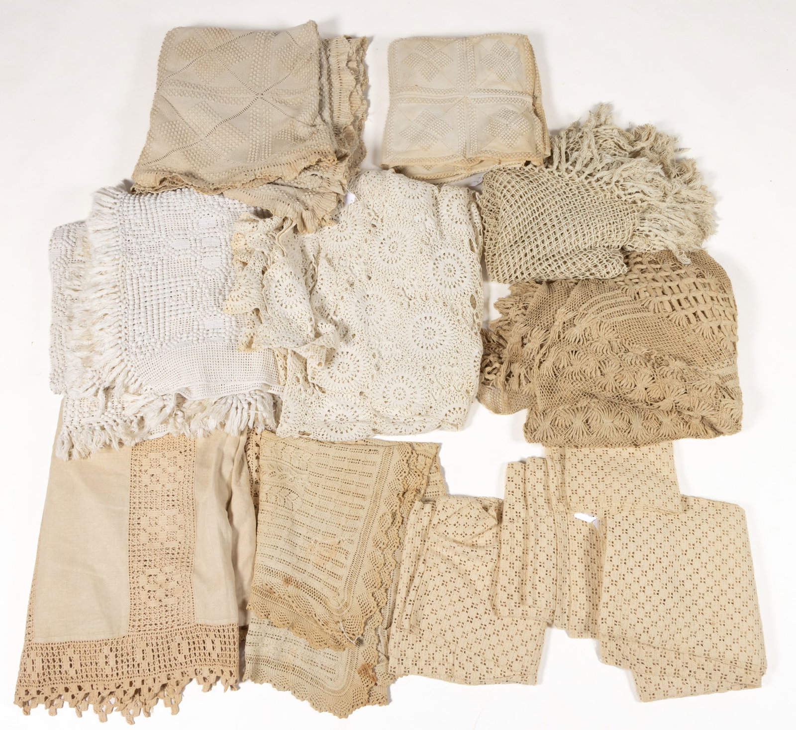 PROBABLY VIRGINIA AND OTHER CROCHETED / KNITTED WHITE BEDDING AND TEXTILES, LOT OF 13: PROBABLY VIRGINIA AND OTHER CROCHETED / KNITTED WHITE BEDDING AND TEXTILES, LOT OF 13, including a "popcorn" bedspread by Mrs. Brittingham of possibly Norfolk, VA with geometric and cro