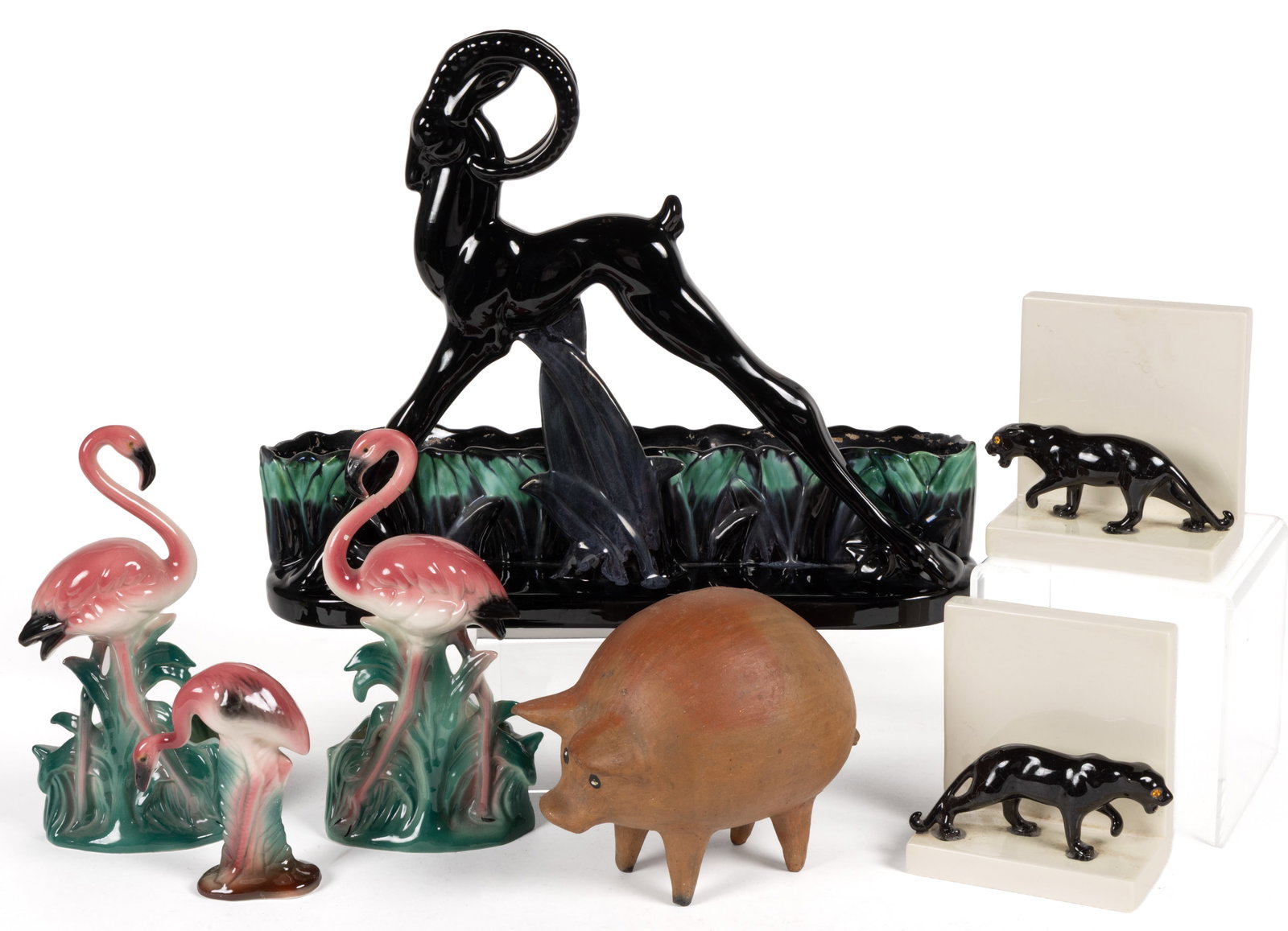 ASSORTED MID-CENTURY CERAMIC FIGURAL ANIMAL ARTICLES, LOT OF SEVEN: ASSORTED MID-CENTURY CERAMIC FIGURAL ANIMAL ARTICLES, LOT OF SEVEN, comprising a Royal Haeger gazelle planter depicting a long-legged deer with curled antlers standing in front of grass-molded co