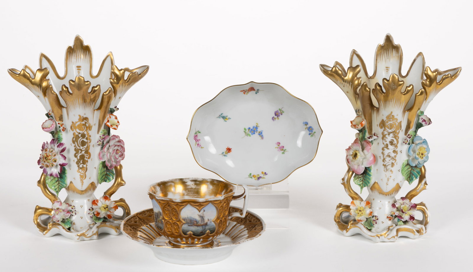 GERMAN MEISSEN AND OTHER PORCELAIN ARTICLES, LOT OF FOUR: GERMAN MEISSEN AND OTHER PORCELAIN ARTICLES, LOT OF FOUR, each having polychrome hand-painted decorations, comprising two Meissen examples consisting of a cup and saucer set including the cup having&n
