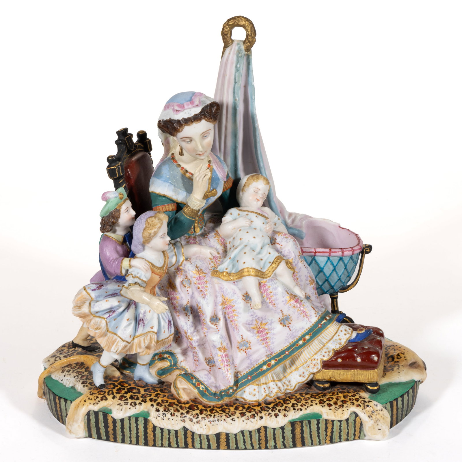 FRENCH LETU & MAUGER BISQUE PORCELAIN HAND-PAINTED FIGURAL GROUP: FRENCH LETU & MAUGER BISQUE PORCELAIN HAND-PAINTED FIGURAL GROUP, having polychrome decorations and on an ovoid base with a leopard skin rug draped on top, depicting a mother sitting beside a bass
