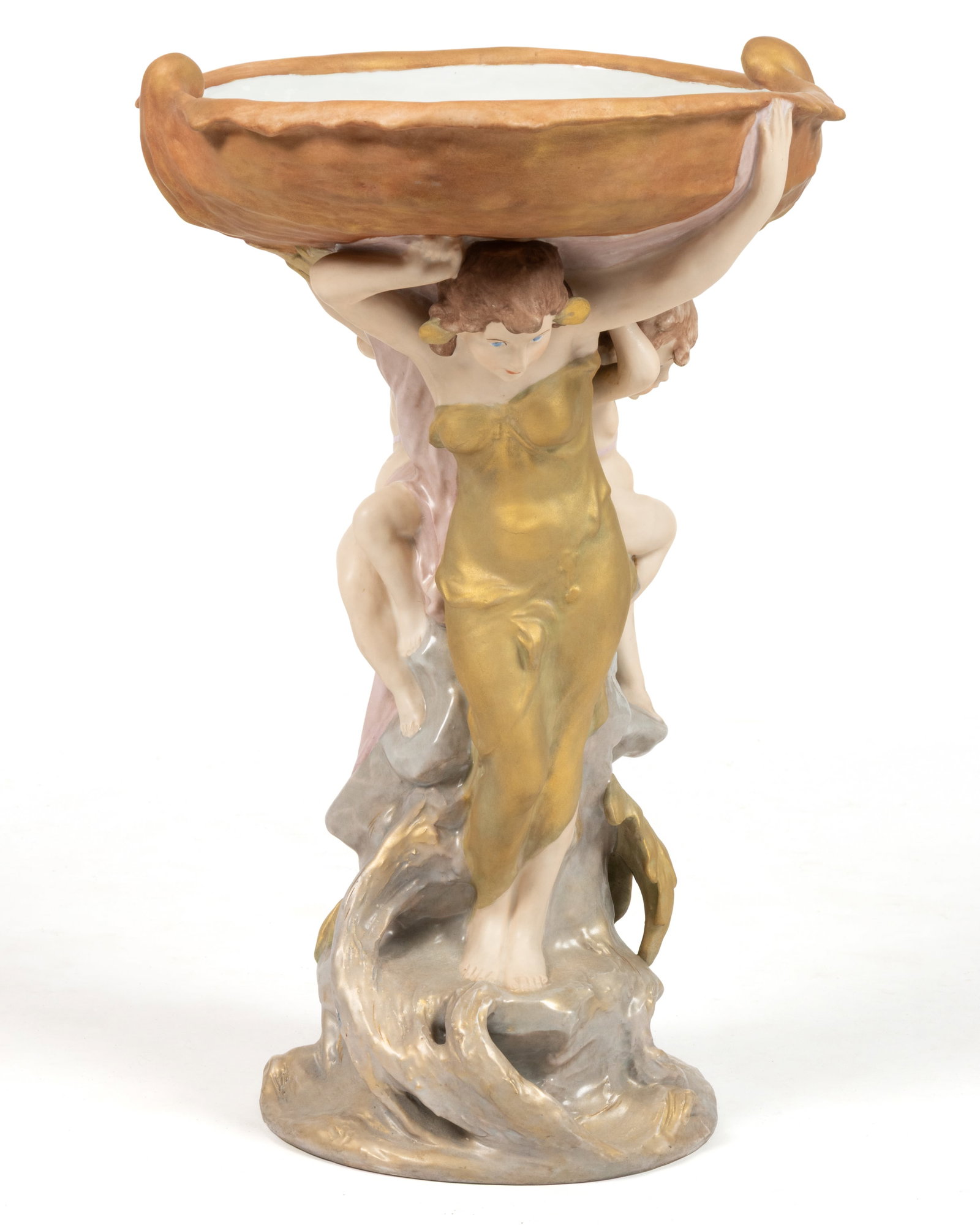 BOHEMIAN ROYAL DUX PORCELAIN FIGURAL GROUP CENTERPIECE: BOHEMIAN ROYAL DUX PORCELAIN FIGURAL GROUP CENTERPIECE, having polychrome hand-painted decorations featuring a young maiden/nymph and two putti standing on a molded rock base and lifting an overs