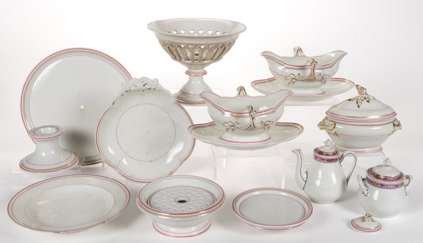 FRENCH PORCELAIN PINK-DECORATED ARTICLES, LOT OF 13: FRENCH PORCELAIN PINK-DECORATED ARTICLES, LOT OF 13, including two sauce boats with attached undertrays, a covered sauce tureen with thistle finial, a bolted compote, a quatre-lobed dish, a butte