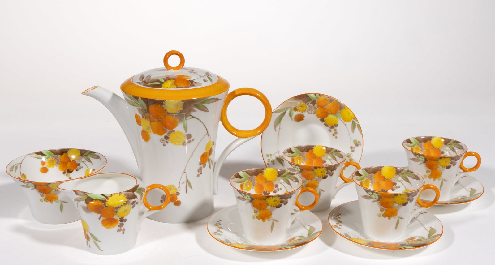 ENGLISH SHELLEY CHINA ART DECO ACACIA SEVEN-PIECE COFFEE SET: ENGLISH SHELLEY CHINA ART DECO ACACIA SEVEN-PIECE COFFEE SET, each having orange rims and featuring bright orange and yellow globular flowers on thin branches, comprising a coffee pot, a creamer,