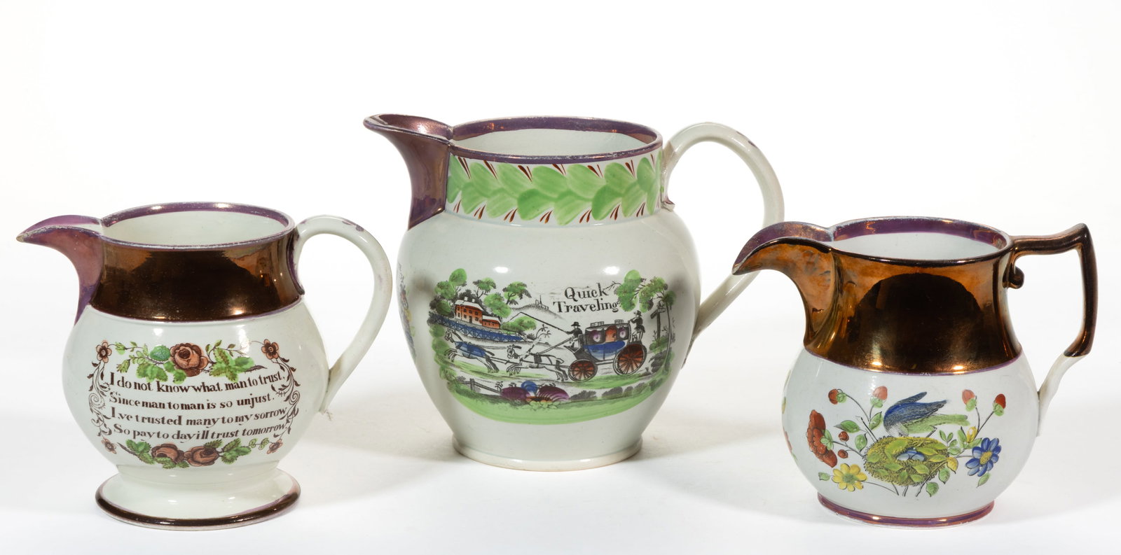 BRITISH PINK LUSTRE AND TRANSFER-PRINTED CERAMIC JUGS / PITCHERS, LOT OF THREE: BRITISH PINK LUSTRE AND TRANSFER-PRINTED CERAMIC JUGS / PITCHERS, LOT OF THREE, each having polychrome enamel decorations and lustre to rim and handle, comprising one example featuring a bird watching