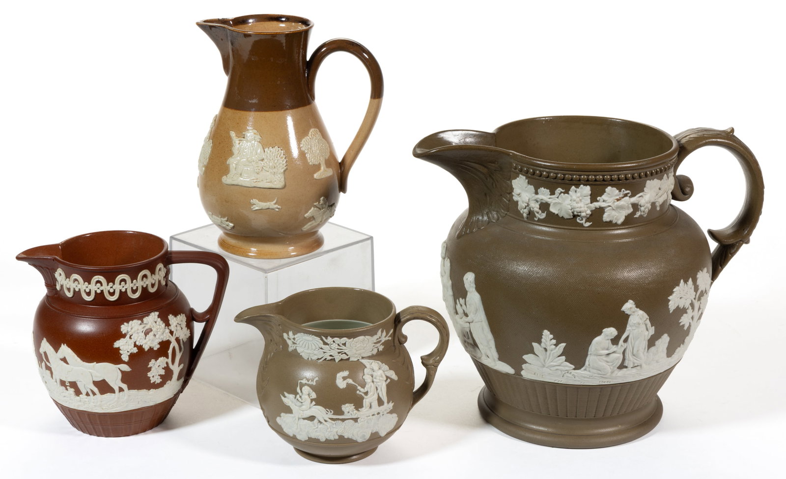 ENGLISH SPRIG-MOLDED STONEWARE JUGS / PITCHERS, LOT OF FOUR (1 of 3)