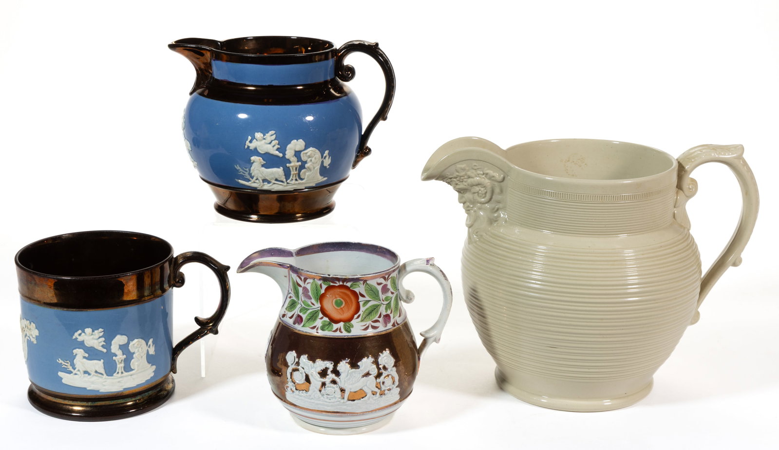 BRITISH MOLDED CERAMIC DRINKING ARTICLES, LOT OF FOUR (1 of 2)
