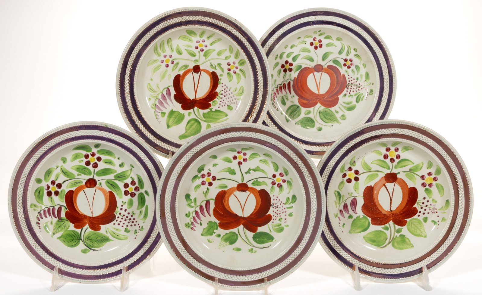BRITISH HAND-PAINTED PINK LUSTRE ROGERS ROSE MOTIF CERAMIC PLATES, LOT OF FIVE: BRITISH HAND-PAINTED PINK LUSTRE ROGERS ROSE MOTIF CERAMIC PLATES, LOT OF FIVE, each having polychrome designs featuring a large rose with green foliate and three smaller red and yellow flowers and bo