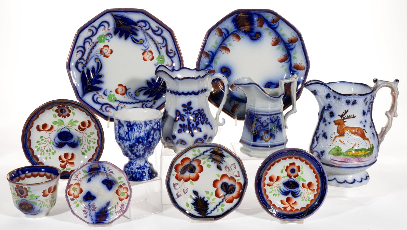 BRITISH GAUDY WELSH AND OTHER BLUE-DECORATED CERAMIC ARTICLES, LOT OF TEN: BRITISH GAUDY WELSH AND OTHER BLUE-DECORATED CERAMIC ARTICLES, LOT OF TEN, comprising one goblet having transfer-printed floral motif, three jugs/pitchers including one titled "EPSOM CUP" fe