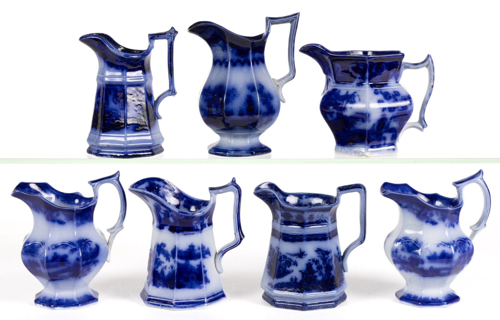 ENGLISH STAFFORDSHIRE FLOW BLUE CHINOISERIE MOTIF IRONSTONE CREAMERS, LOT OF SEVEN (1 of 1)