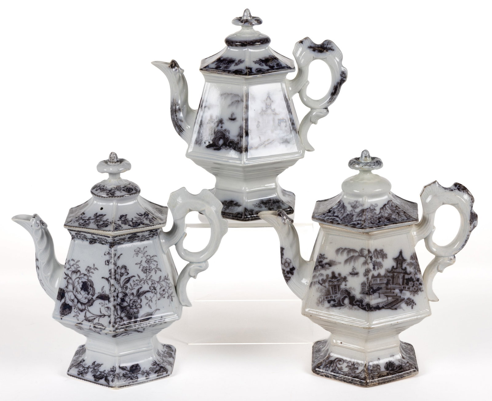 ENGLISH STAFFORDSHIRE FLOW-DECORATED / MULBERRY IRONSTONE COFFEE POTS, LOT OF THREE: ENGLISH STAFFORDSHIRE FLOW-DECORATED / MULBERRY IRONSTONE COFFEE POTS, LOT OF THREE, each of hexagonal form with cockscomb handle, comprising two examples having Chinoiserie motif featuring Hong 