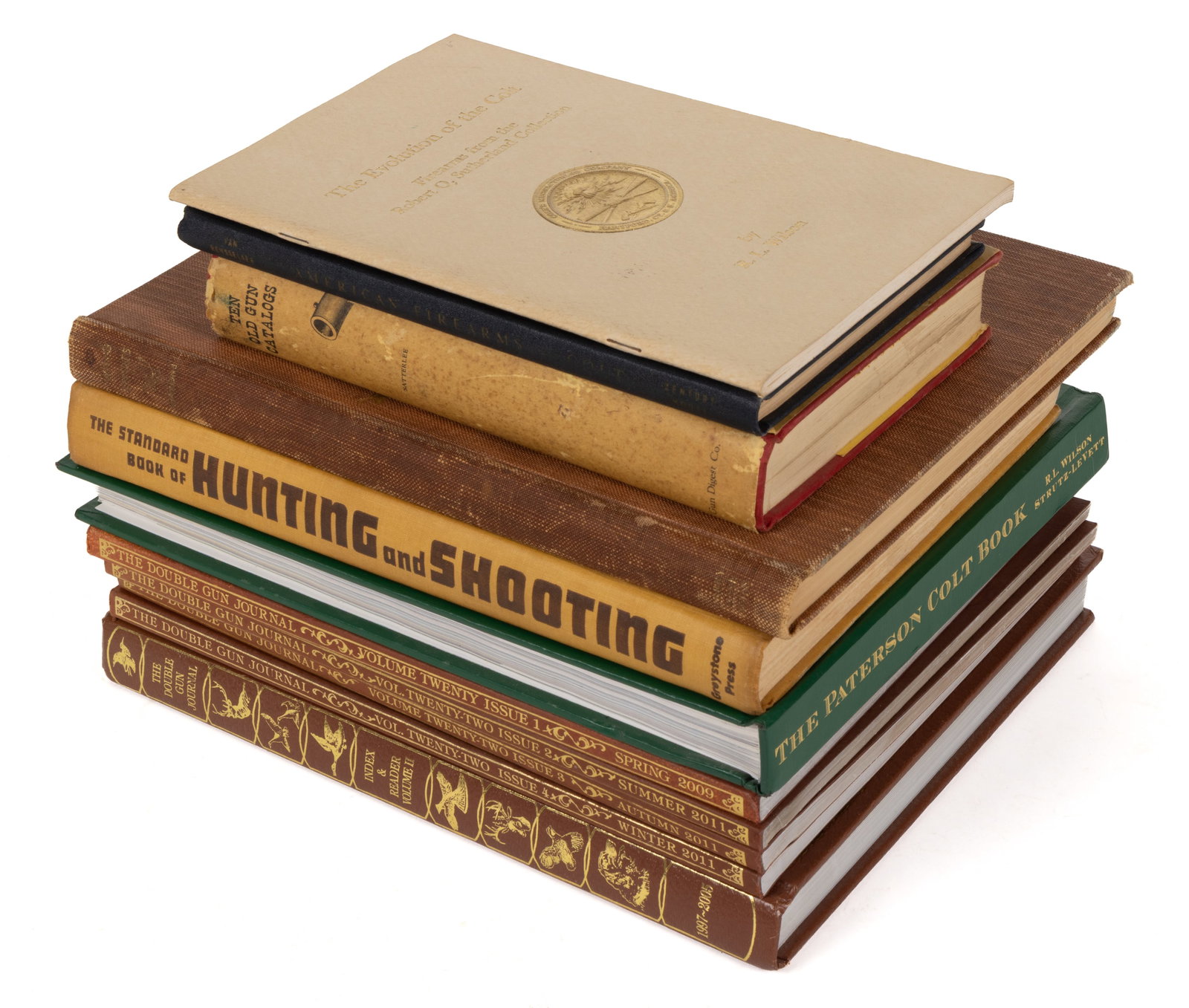ASSORTED FIREARMS AND SPORTING VOLUMES, LOT OF 11: ASSORTED FIREARMS AND SPORTING VOLUMES, LOT OF 11, including (1) Wilson, The Patterson Colt Book - The Early Evolution of Samuel Colt's Repeating Arms, signed #77/3,000 limited edition; (2) S